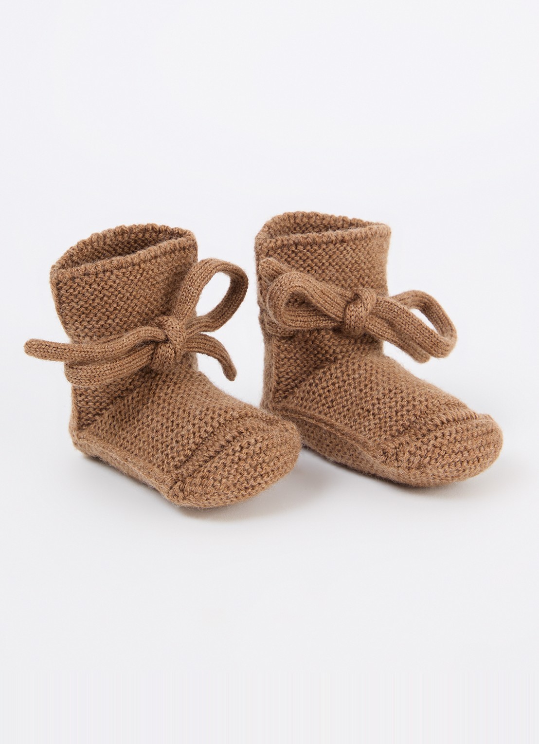 Hvid Babyslofjes van merino wol - voorkant bruin