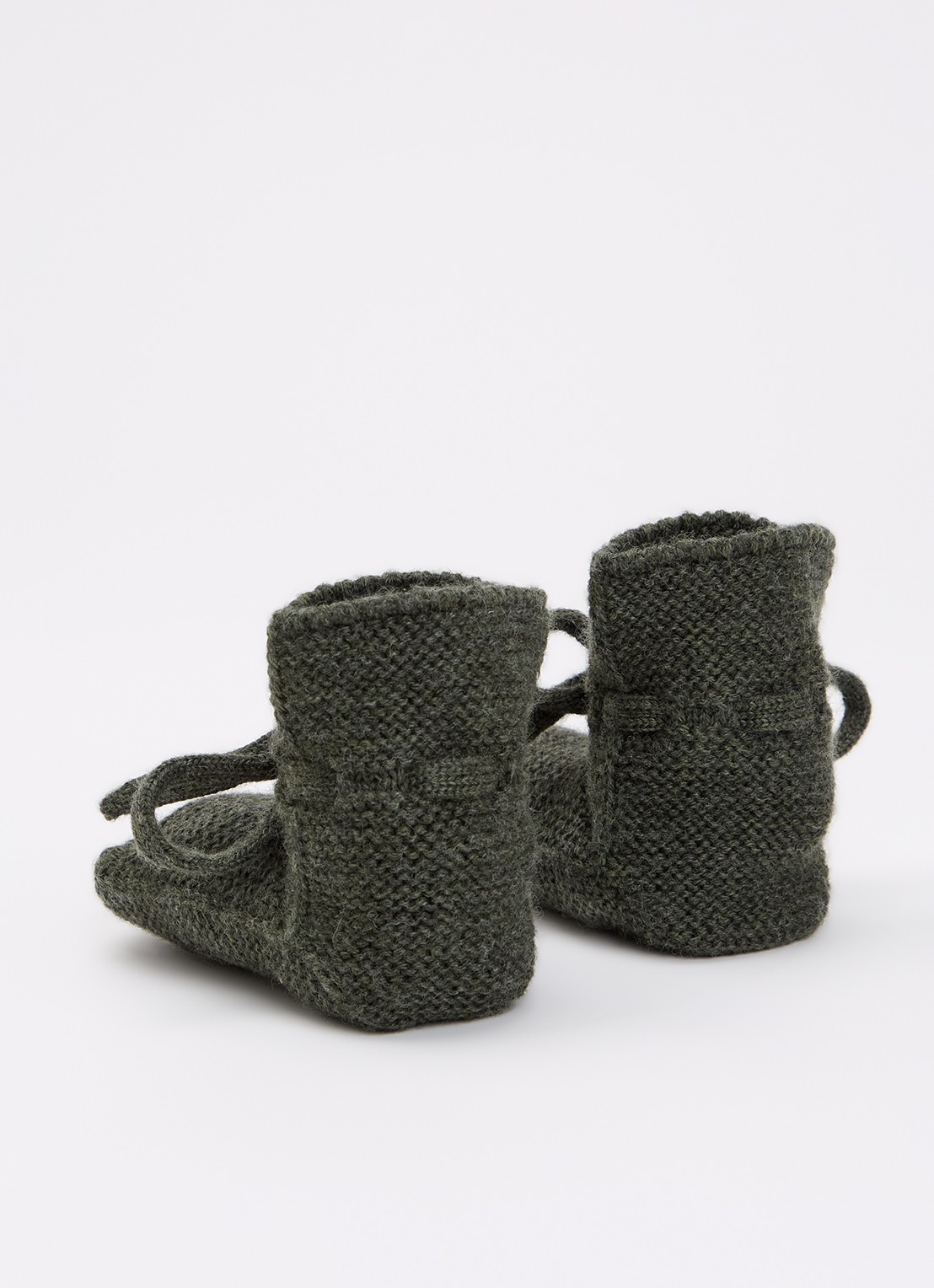 Hvid Babyslofjes van merino wol - achterkant 4 groen
