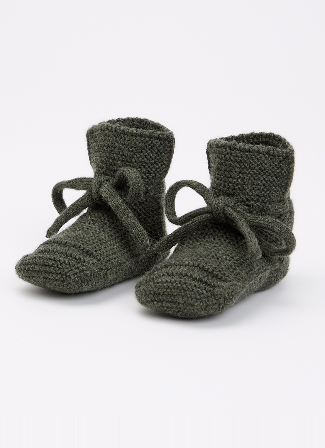 Hvid Babyslofjes van merino wol - voorkant 2 groen