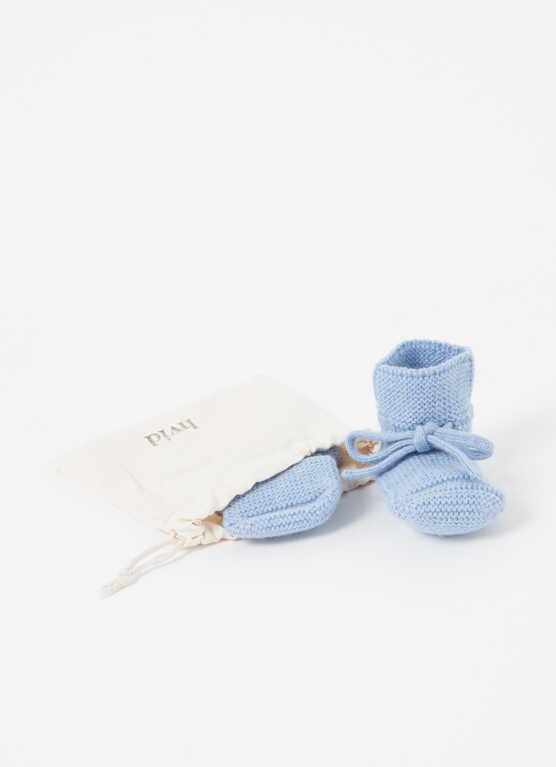 Hvid Babyslofjes van merino wol - detail 4 lichtblauw