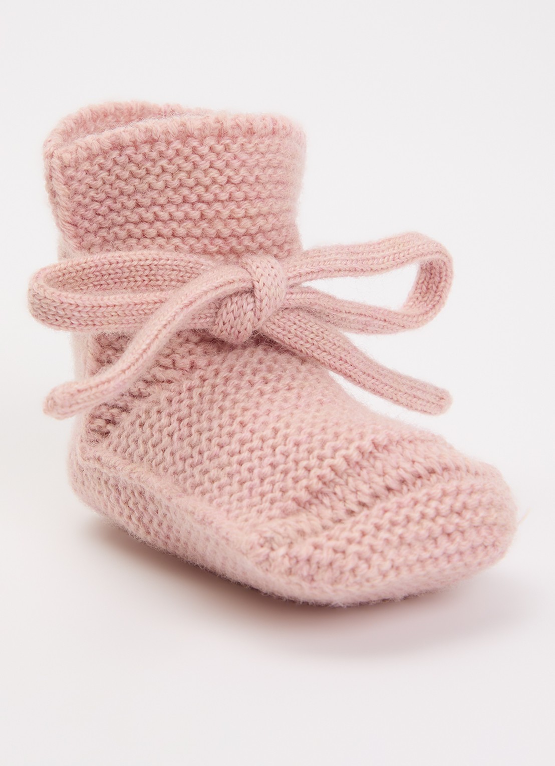 Hvid Babyslofjes van merino wol - voorkant lichtroze