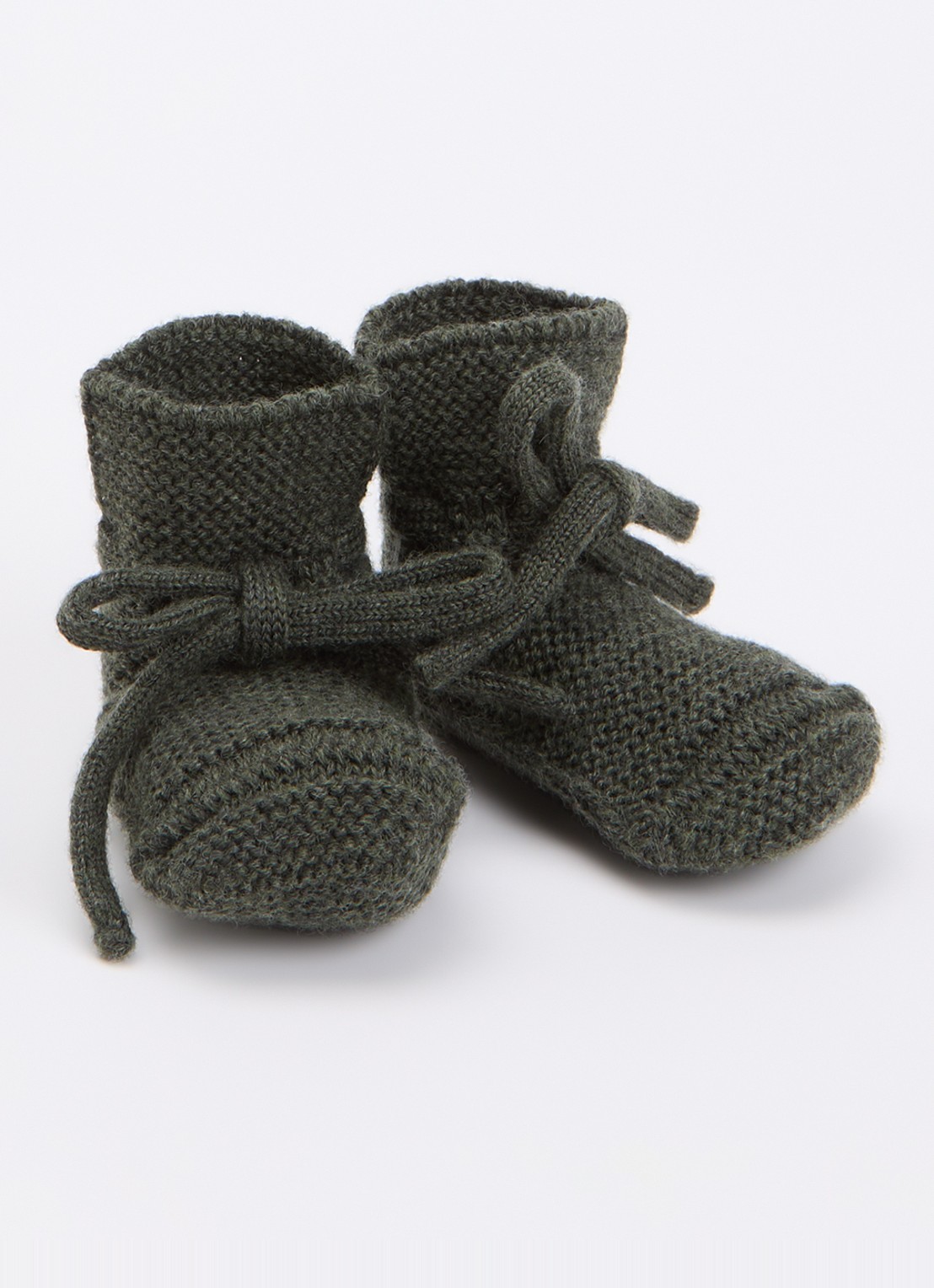 Hvid Babyslofjes van merino wol - voorkant groen