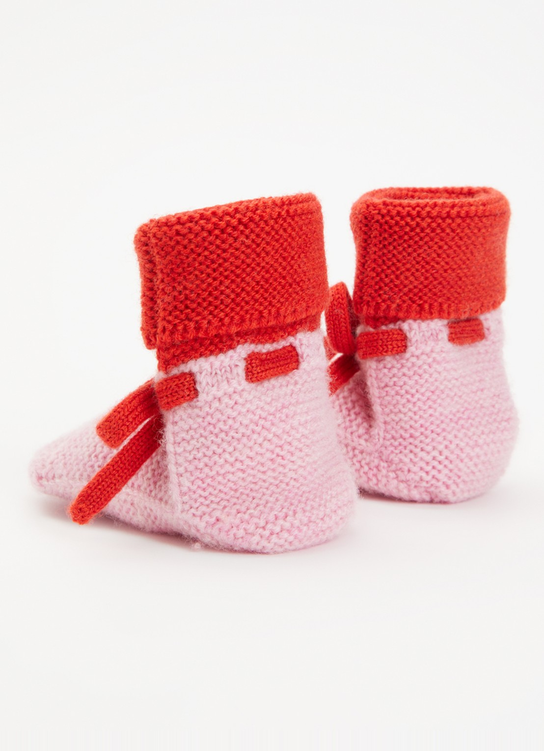 Hvid Babyslofjes van merino wol  - achterkant 3 roze