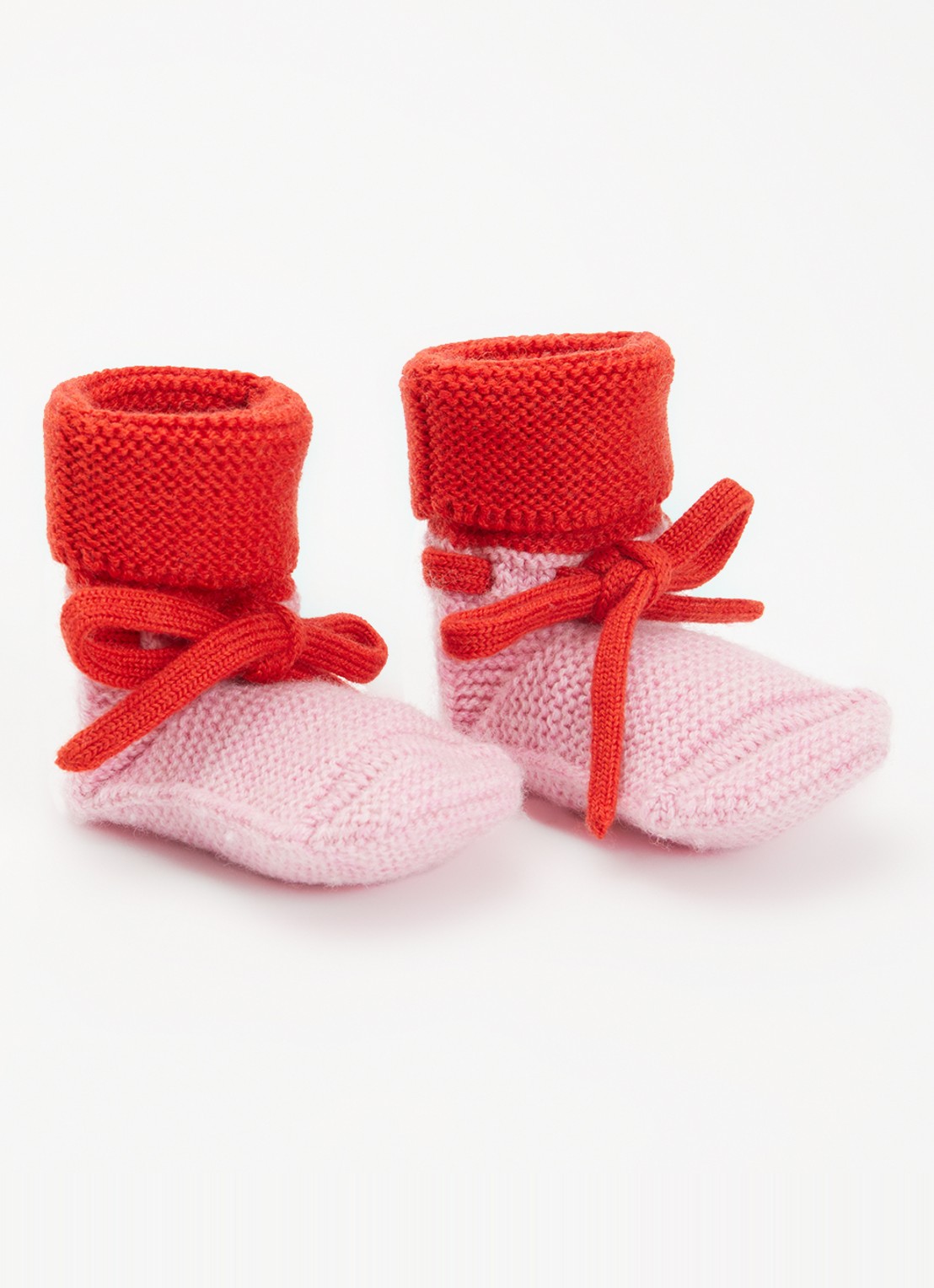 Hvid Babyslofjes van merino wol  - voorkant 2 roze