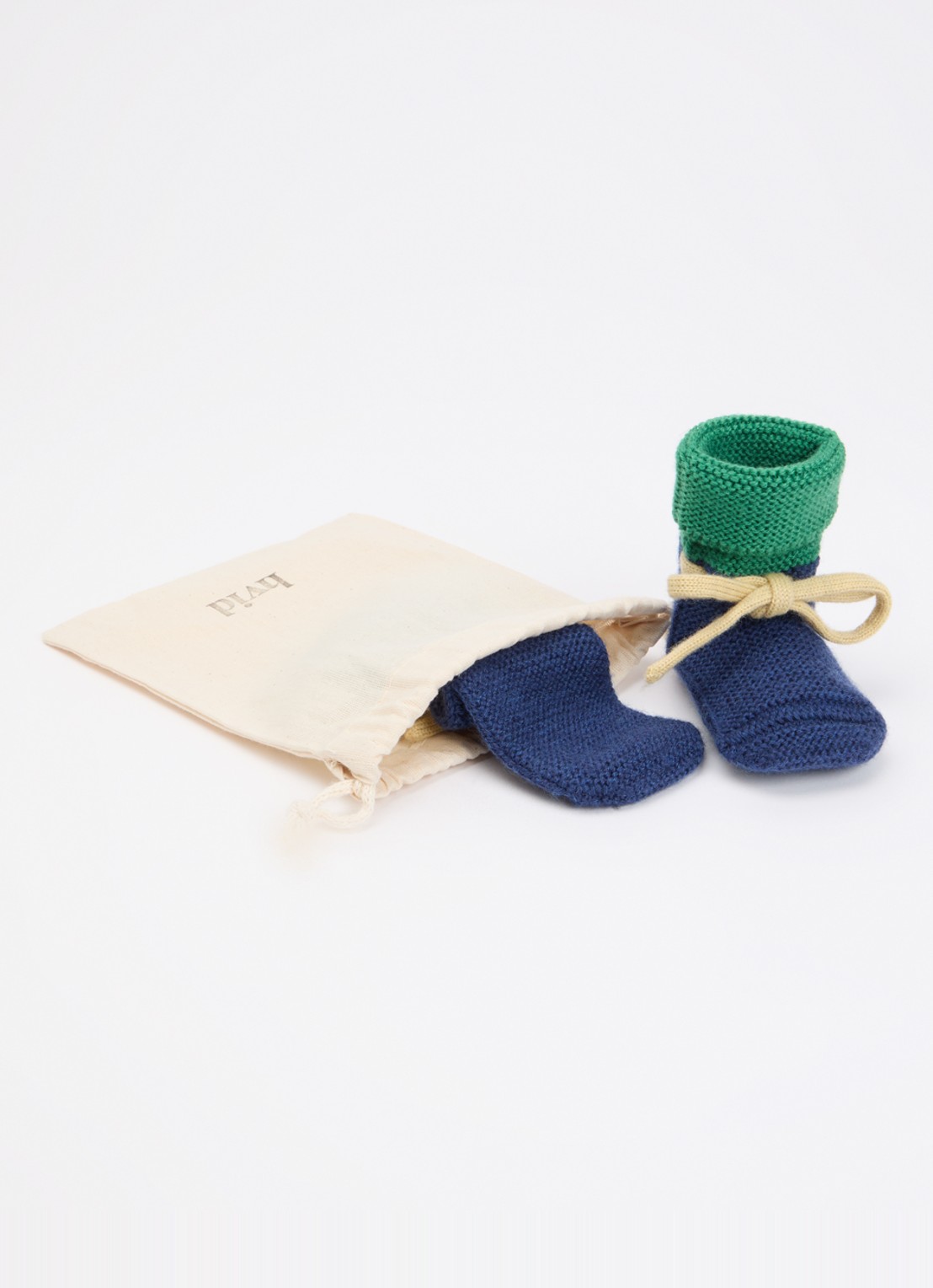 Hvid Babyslofjes van merino wol  - voorkant 3 donkerblauw