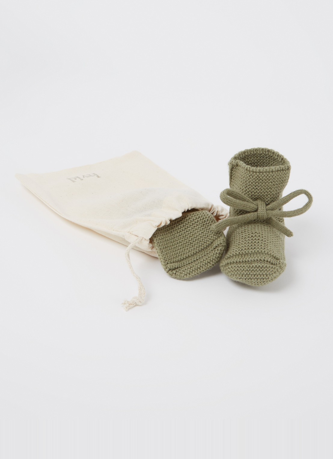 Hvid Booties gebreide babyslofjes van wol - voorkant 2 mosgroen