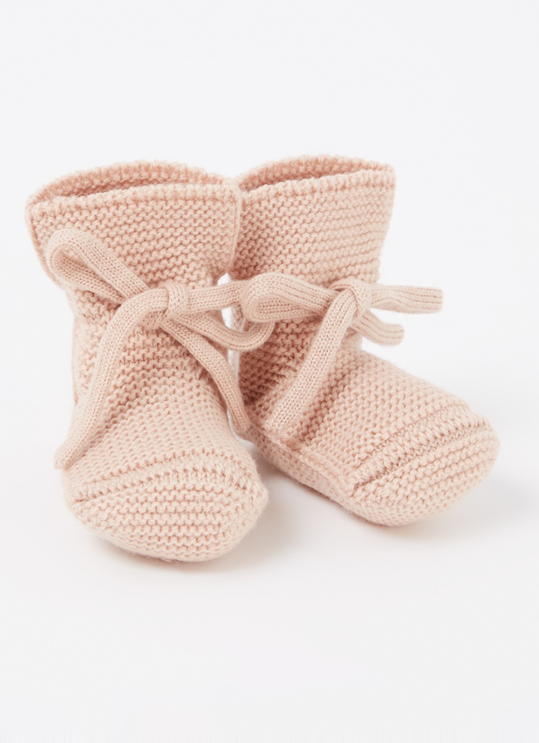 Hvid Booties gebreide babyslofjes van wol - voorkant 2 zalmroze