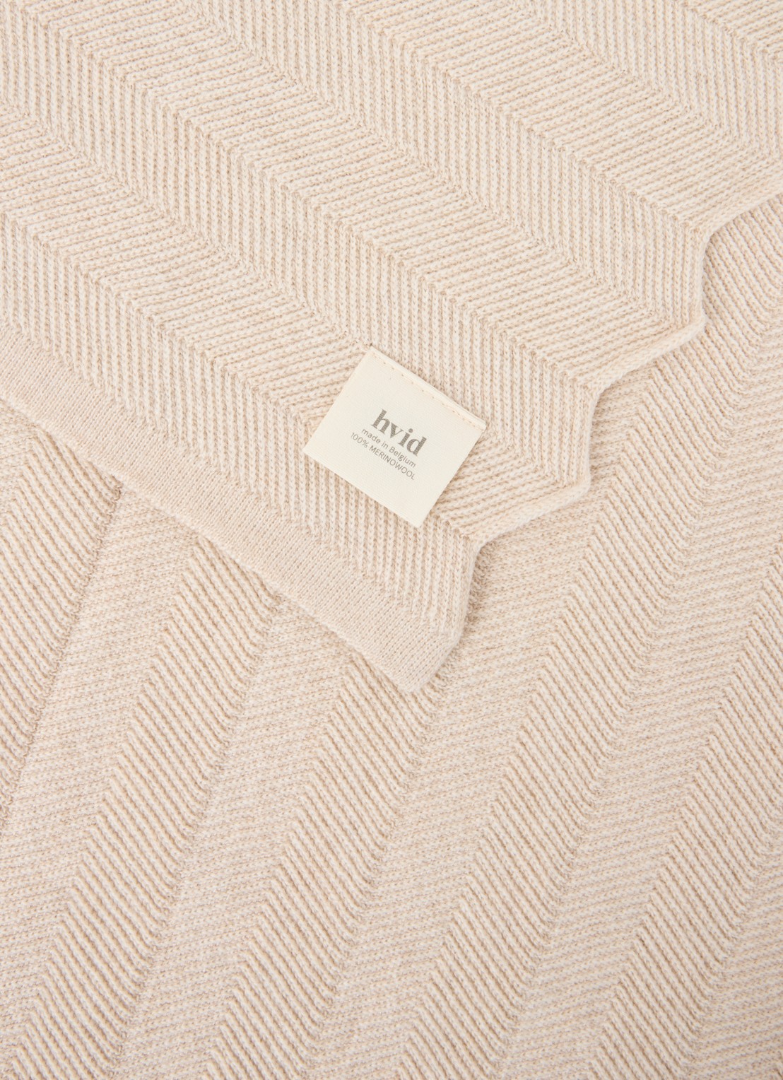 Hvid Freddie wiegdeken van merino wol 100 x 75 cm - detail beige