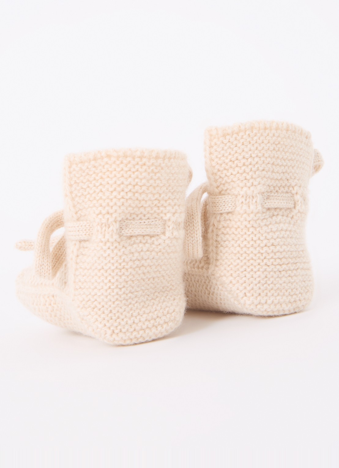 Hvid Gebreide babyslofjes van wol - achterkant gebroken wit