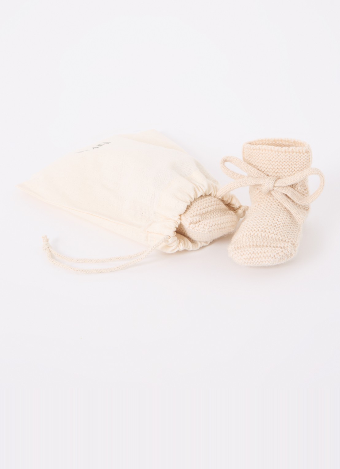 Hvid Gebreide babyslofjes van wol - voorkant 3 gebroken wit