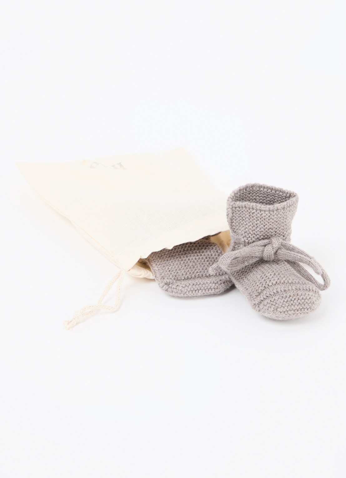 Hvid Gebreide babyslofjes van wol - voorkant 4 taupe
