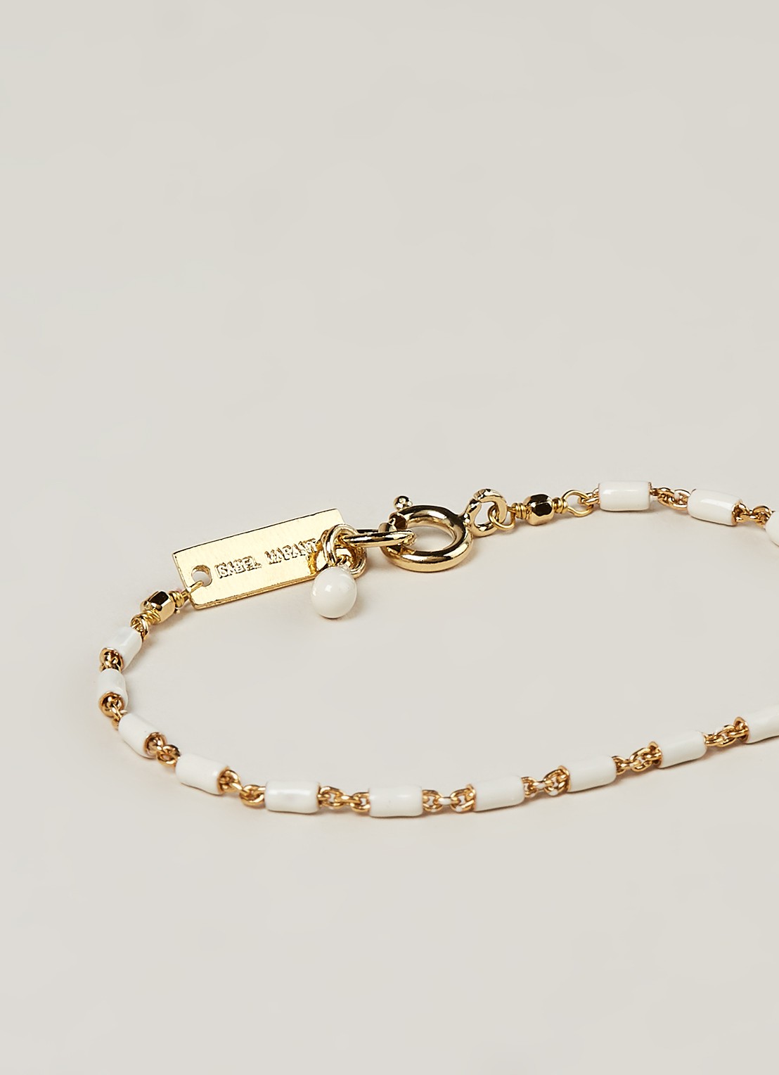 Isabel Marant Casablanca armband met witte details  - detail goud