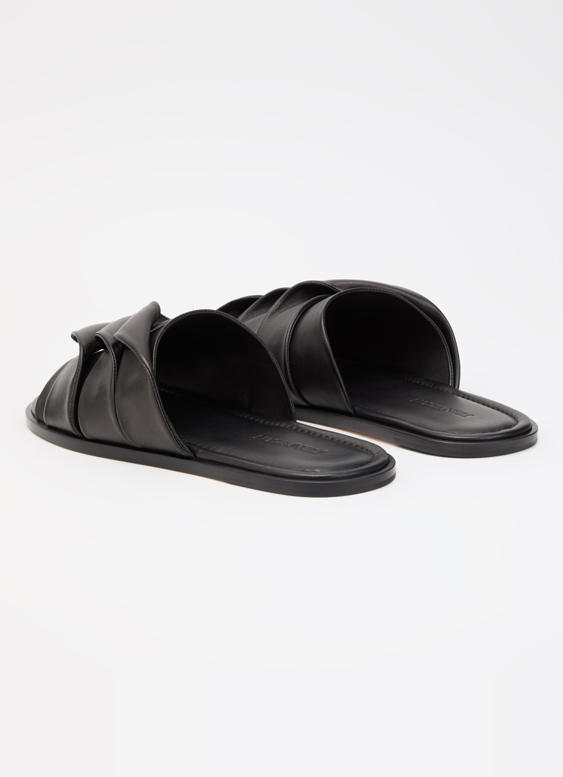 J.W. Anderson Coil slipper van leer - achterkant 2 zwart