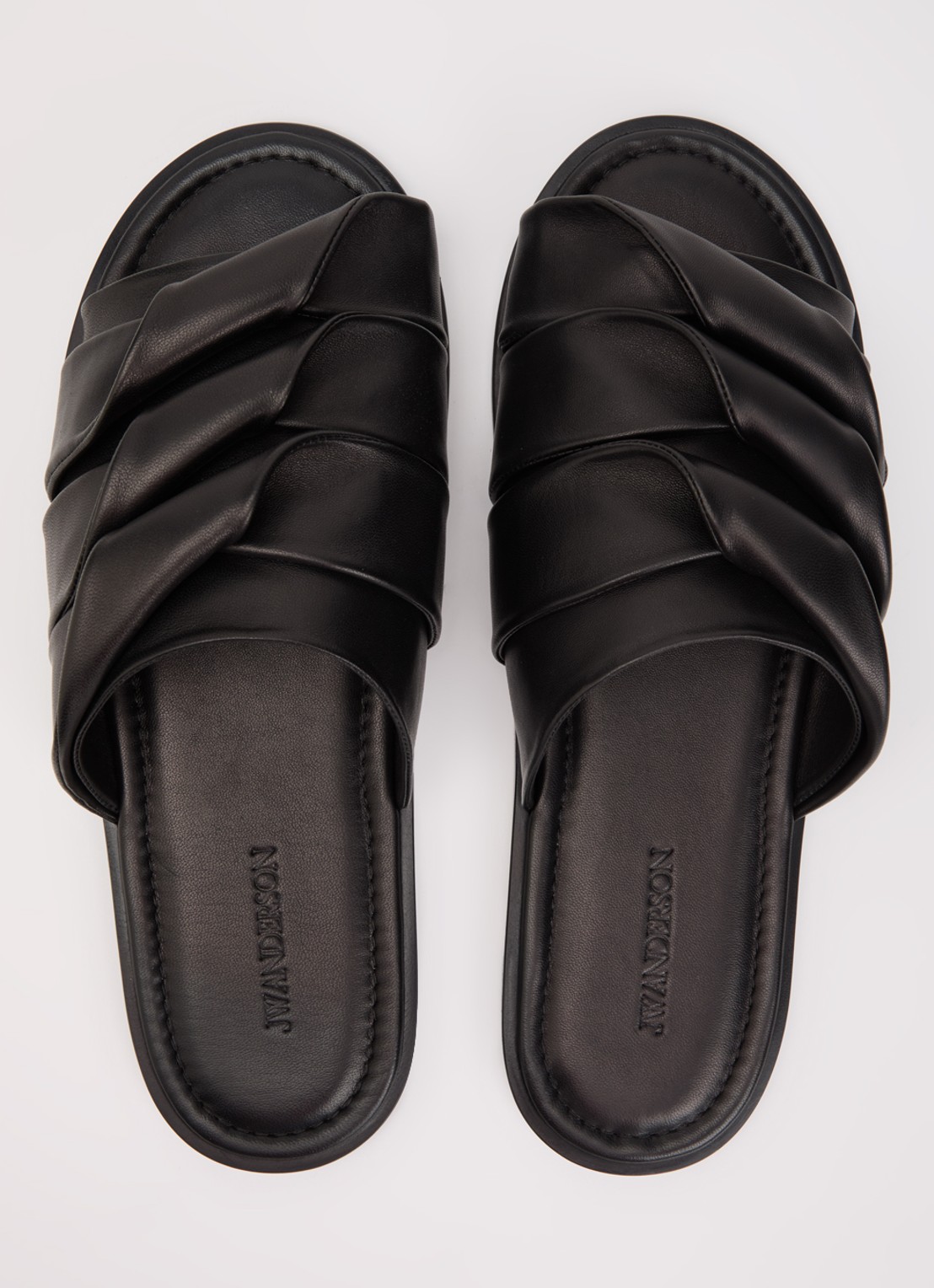 J.W. Anderson Coil slipper van leer - detail 4 zwart