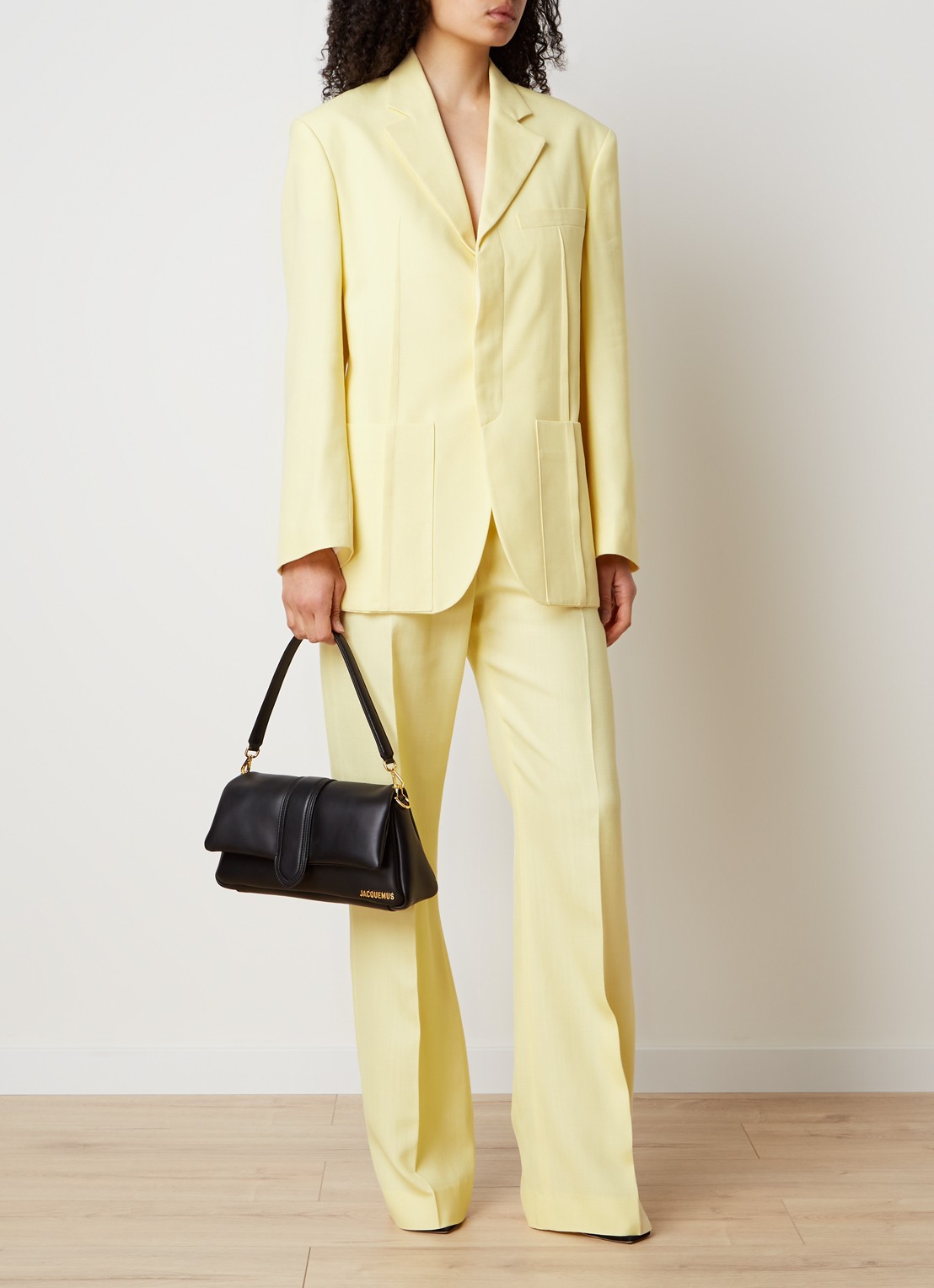 Jacquemus Sauge high waist flared fit pantalon met steekzakken - voorkant 3 lichtgeel