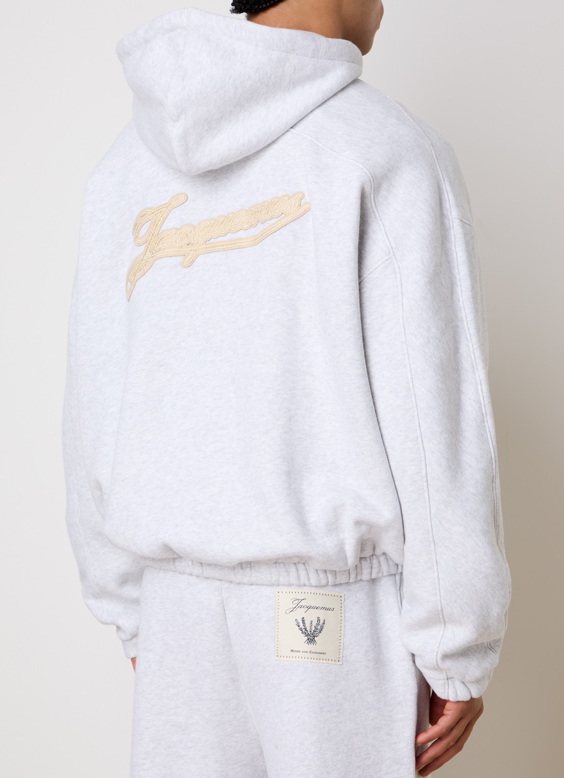 Jacquemus Sweatvest met capuchon en logoborduring - achterkant grijsmele