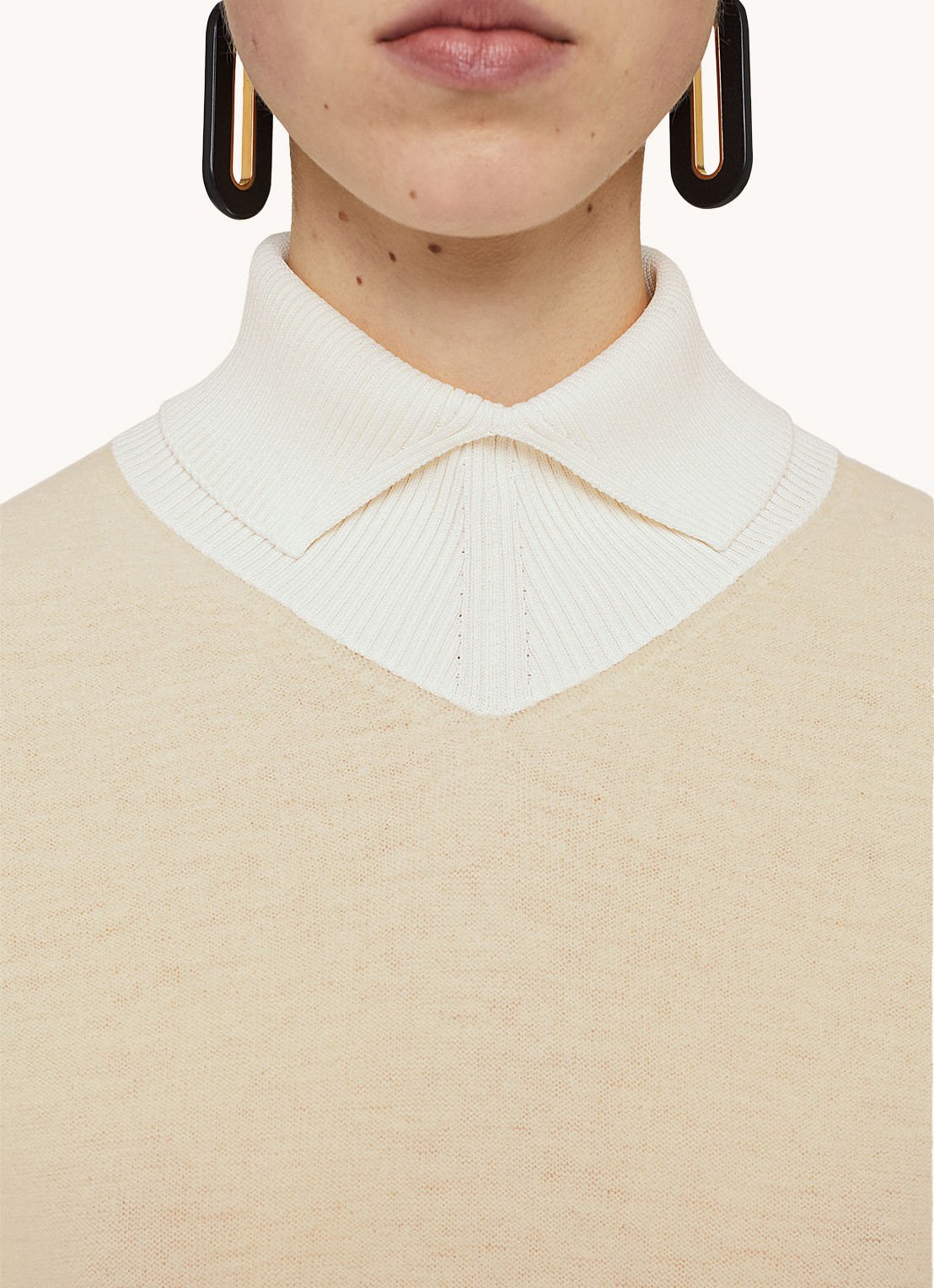 Jil Sander Fijngebreide trui in wolblend - detail lichtgeel