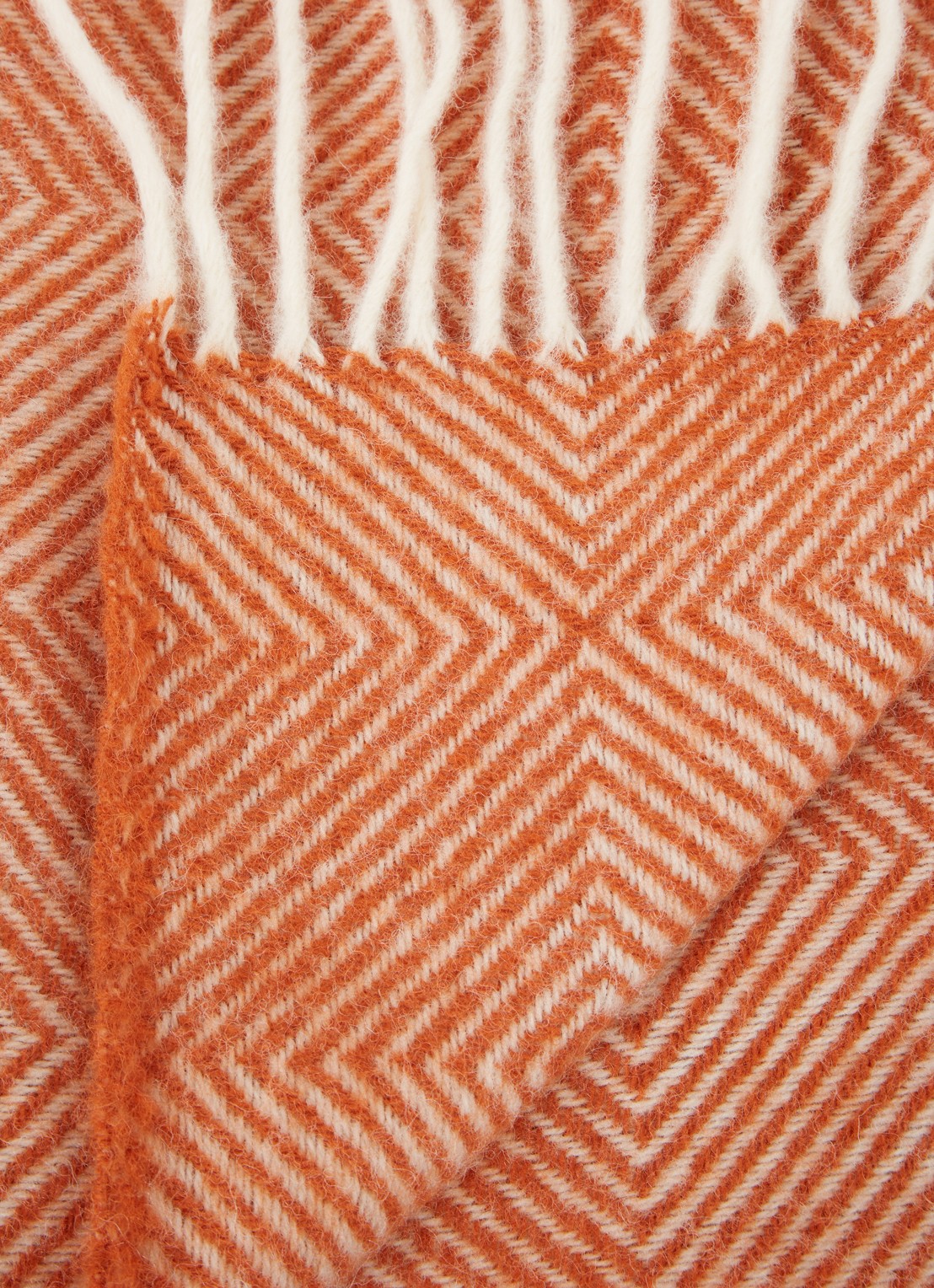 Klippan Gooseye plaid van wol 130 x 200 cm - detail 3 donkeroranje