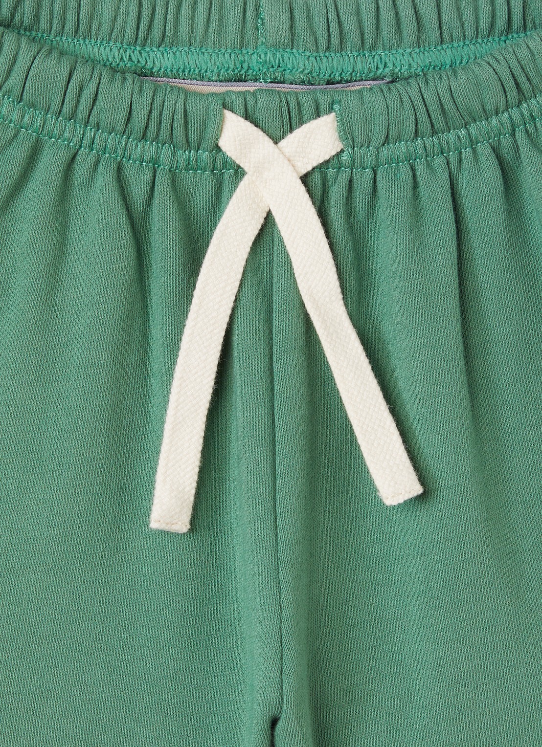 Konges Sløjd Loose fit korte joggingbroek  - detail groen
