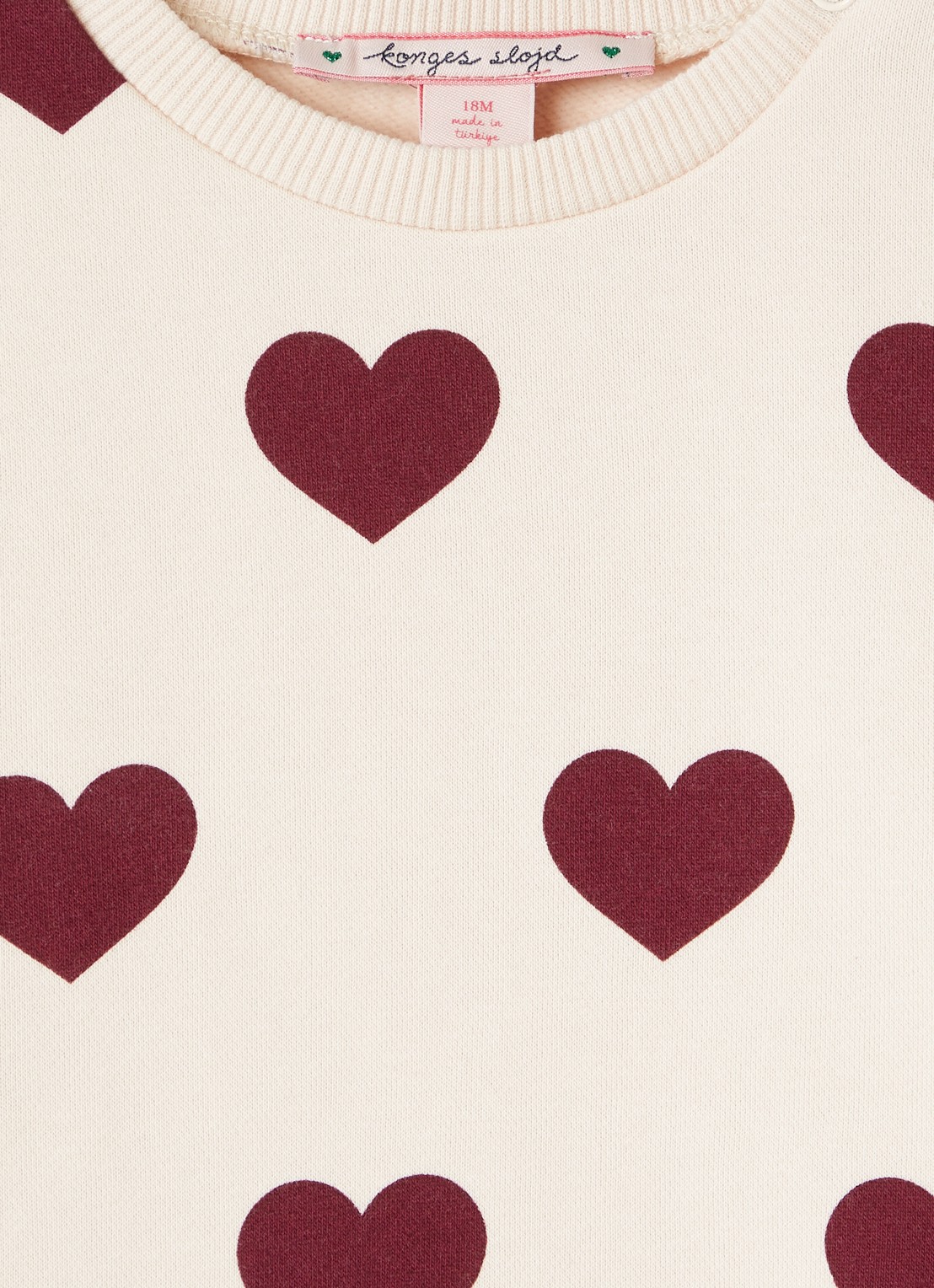 Konges Sløjd Lou sweater met print - detail lichtroze