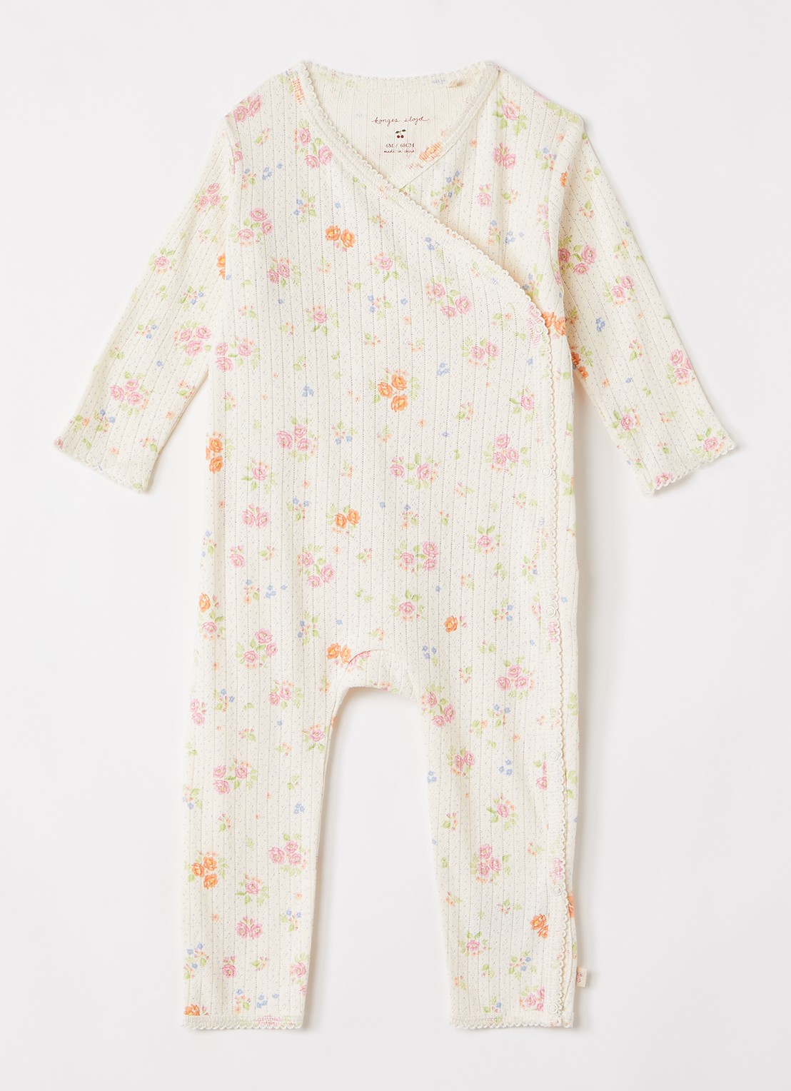Konges Sløjd Minnie babypak met bloemenprint - voorkant creme