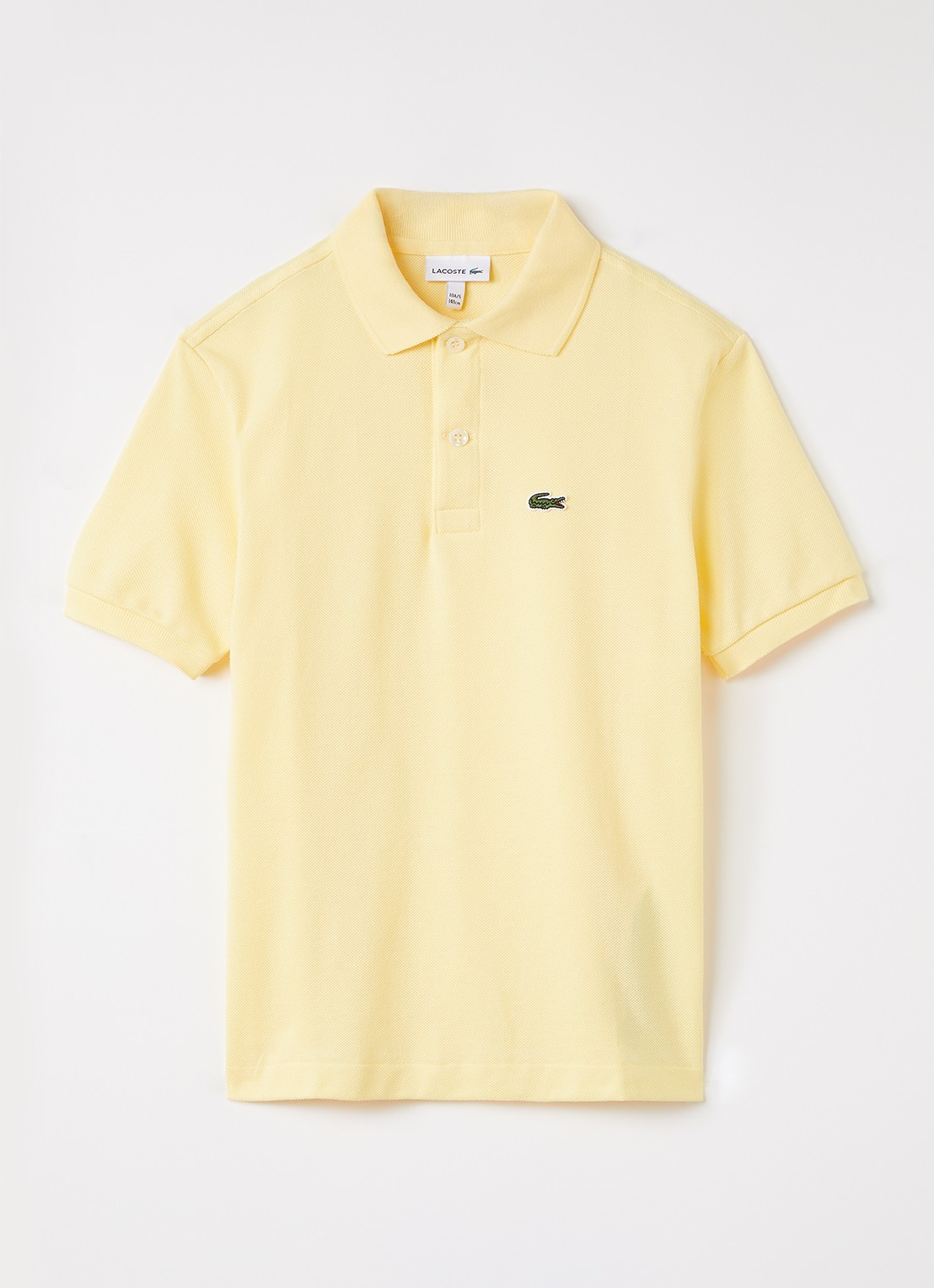 Lacoste Polo van piqué katoen met logo - voorkant lichtgeel