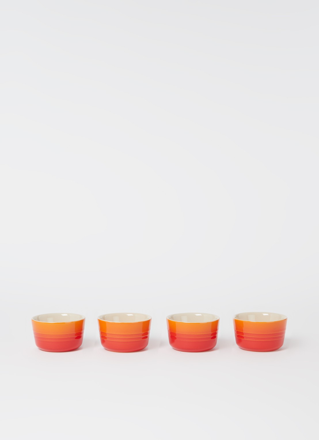 Le Creuset Mini ramekin 7,2 cm set van 4 - voorkant 2 oranjerood / oranje