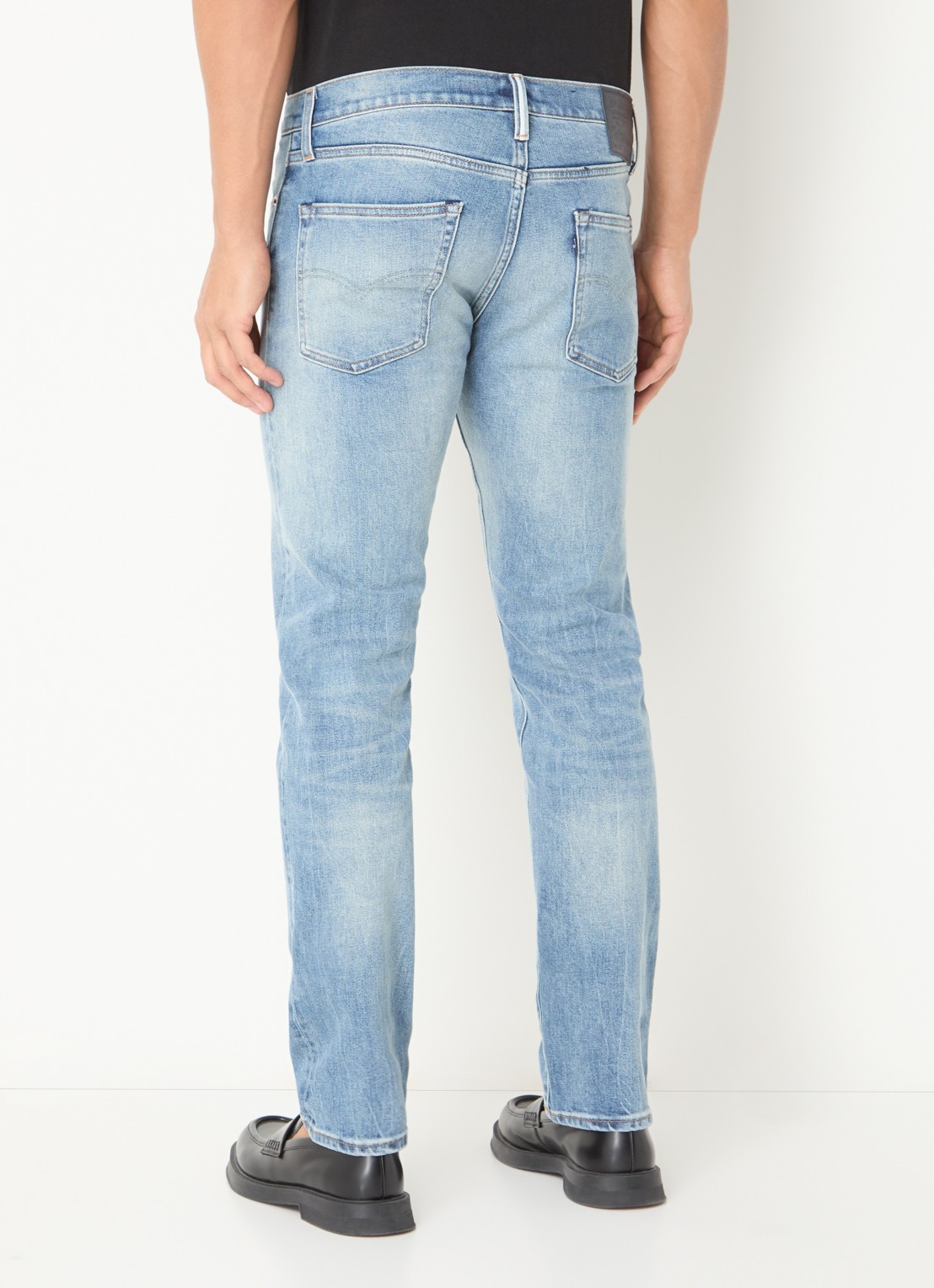 Levi's 511 slim fit jeans met medium wassing en steekzakken - achterkant 5 indigo