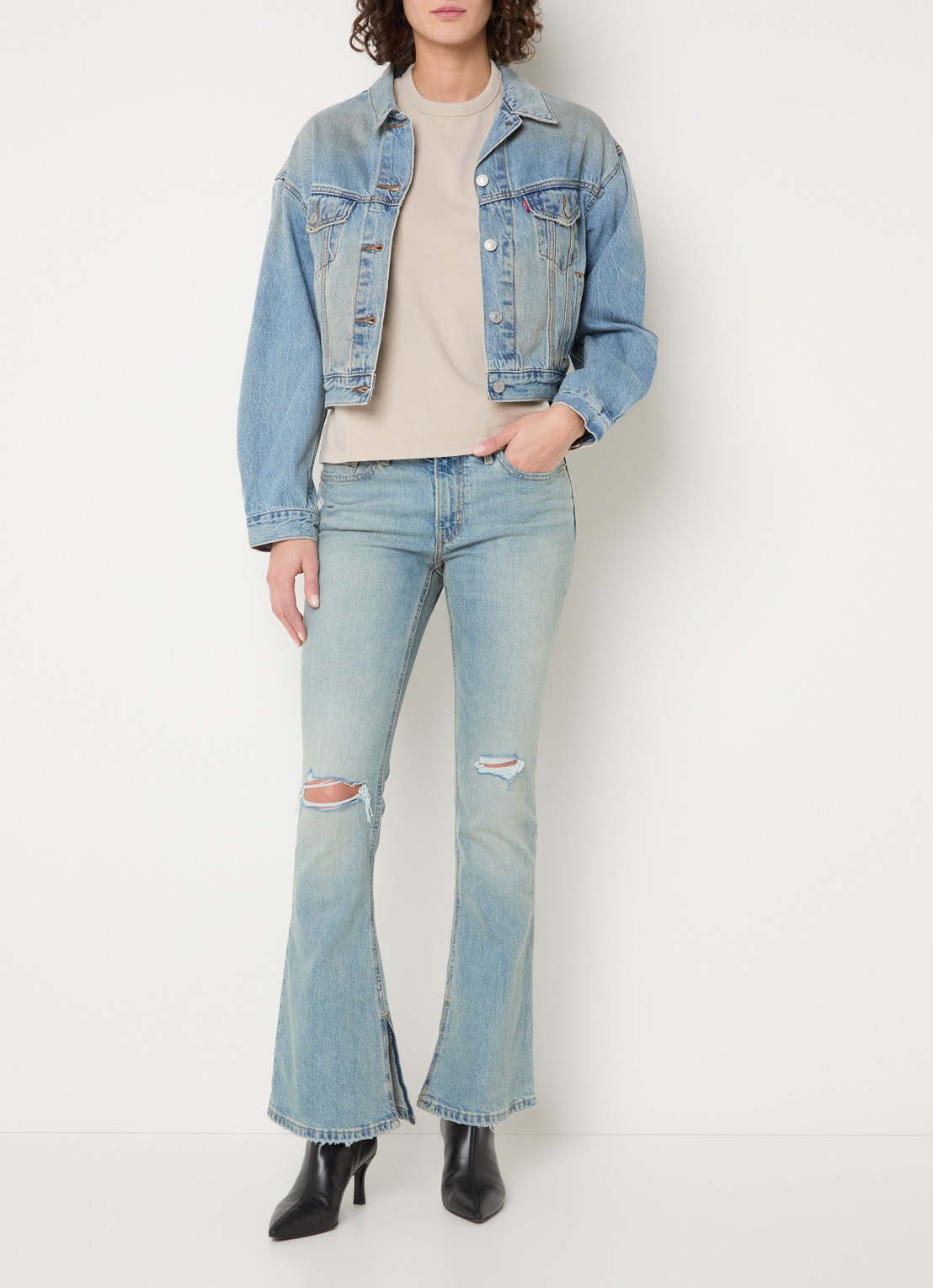 Levi's Mid waist bootcut jeans met lichte wassing en destroyed afwerking - voorkant 2 indigo
