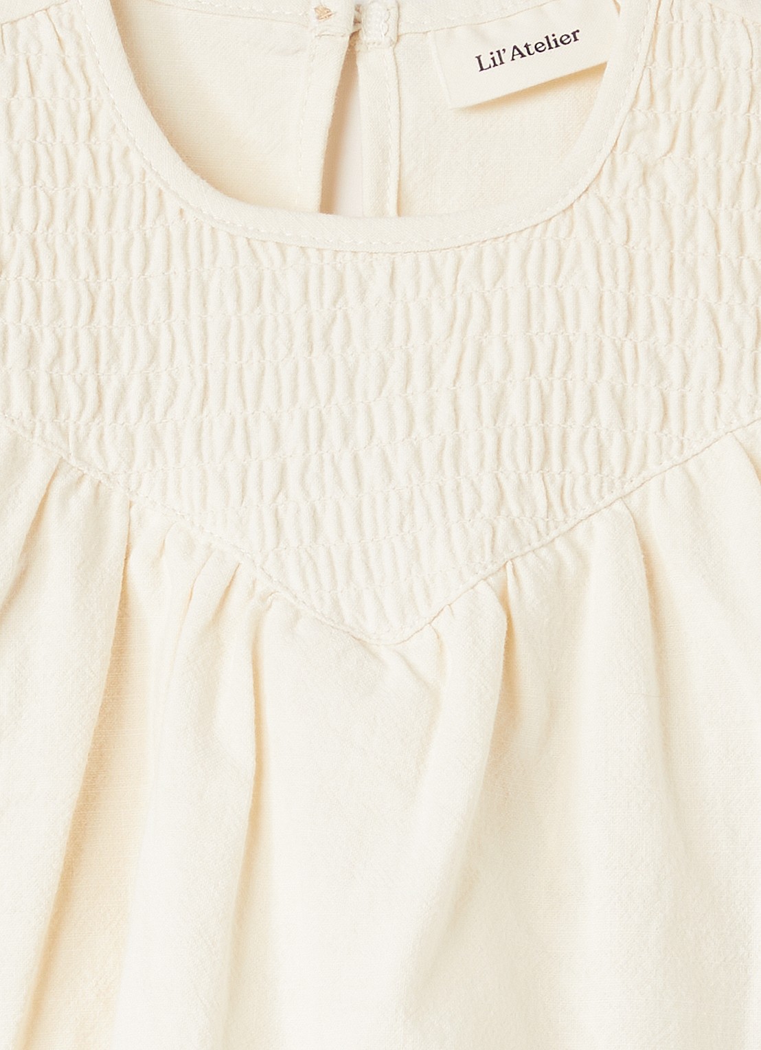 Lil 'Atelier NBFNella jurk met smockwerk - detail ivoor