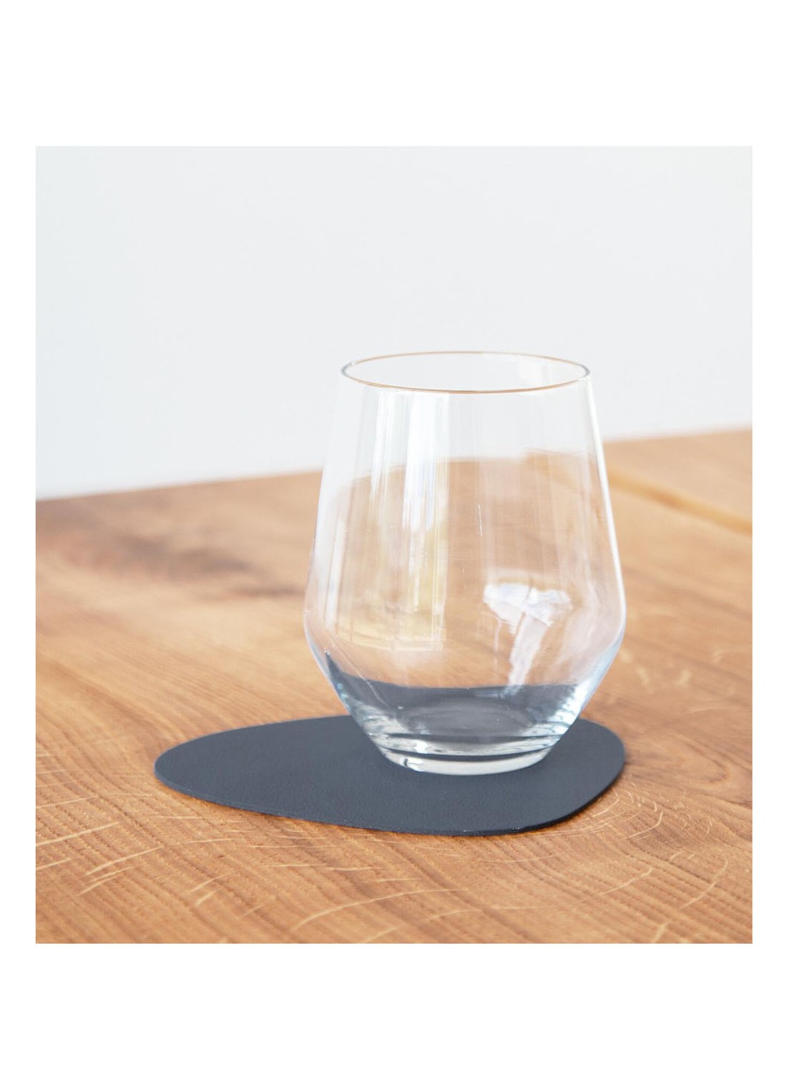 LIND DNA Curve Nupo onderzetter van  leer set van 4 - voorkant 2 donkerblauw