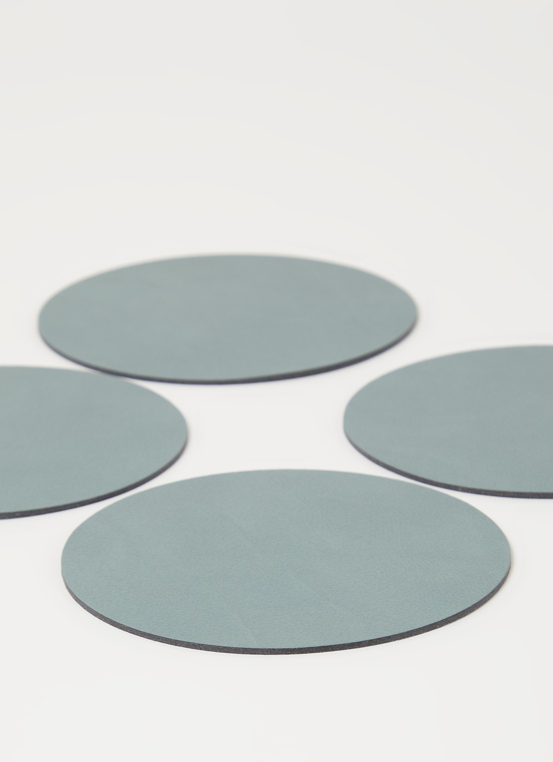 LIND DNA Glass Mat Circle onderzetter van leer set van 4 - detail zeegroen