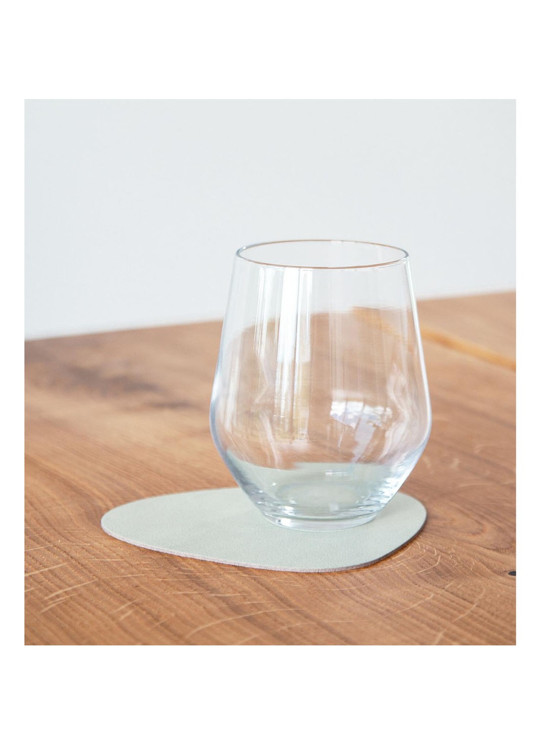 LIND DNA Glass Mat Curve onderzetter van leer - voorkant 2 lichtgroen