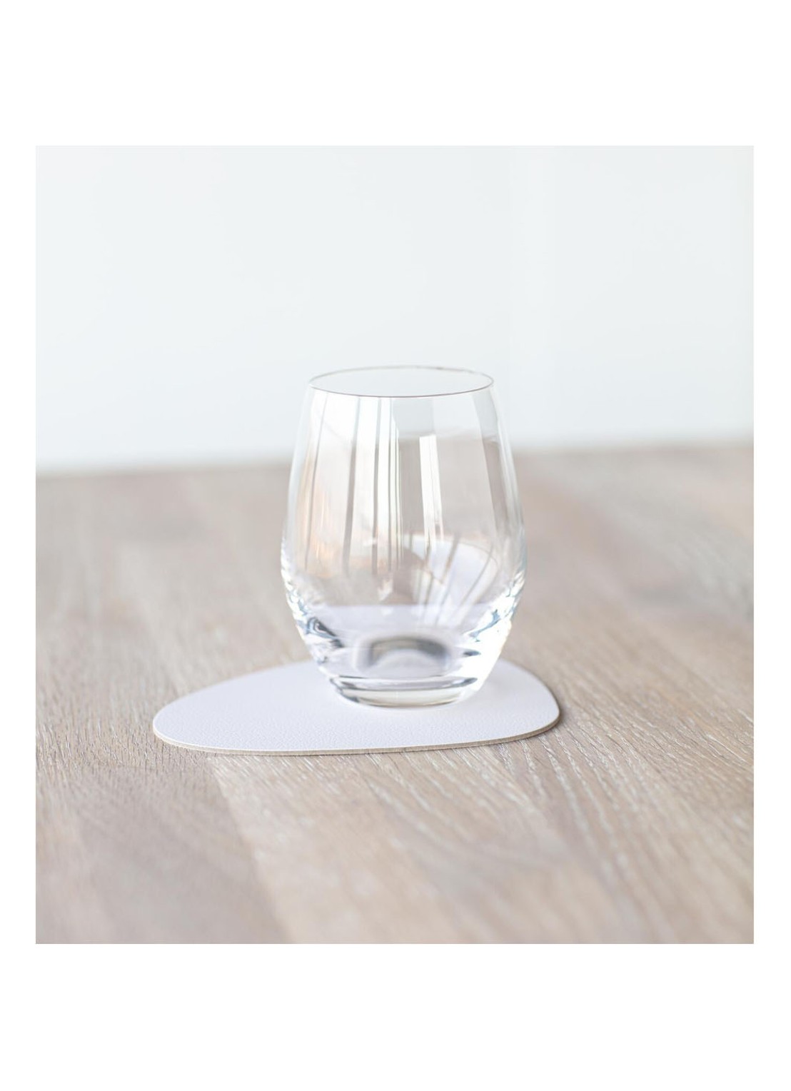 LIND DNA Glass Mat Curve onderzetter van leer  - voorkant 3 beige