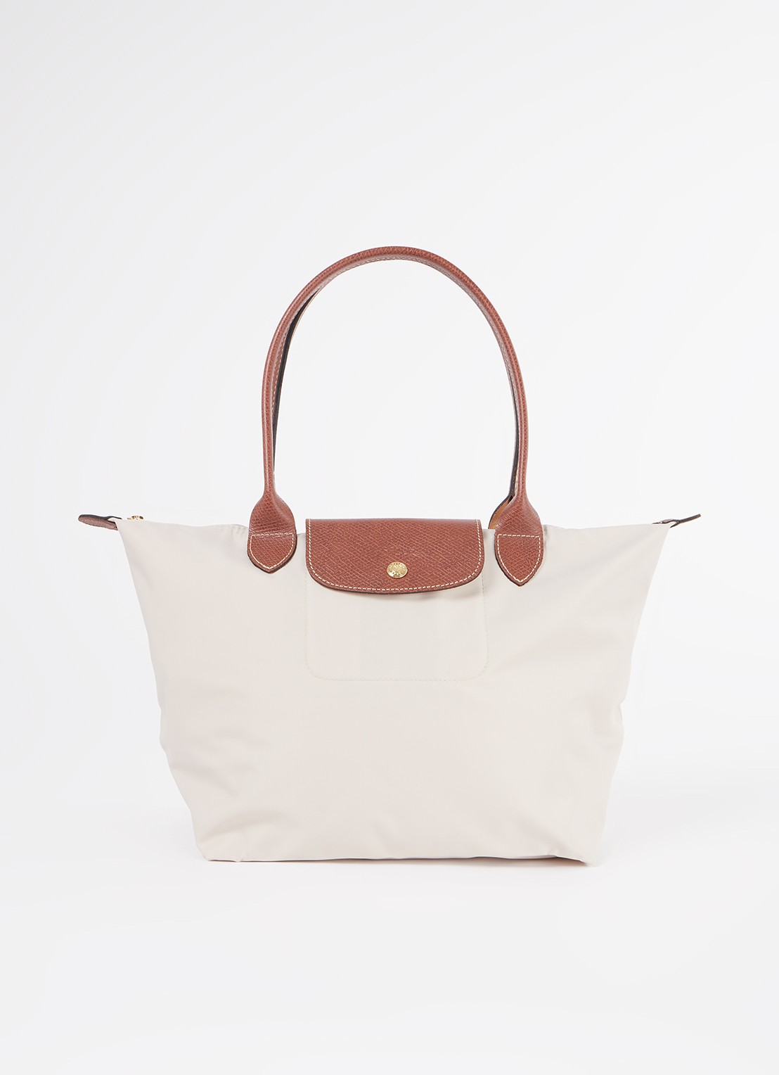 Longchamp Le Pliage schoudertas M met leren details - voorkant creme