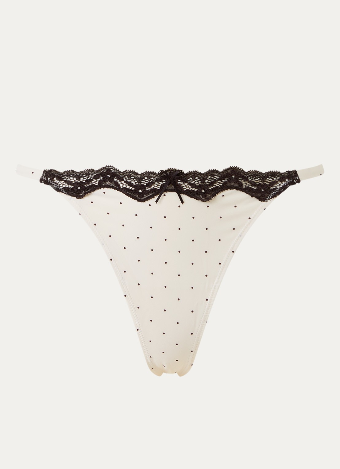 Lounge Reve string met stippenprint en kant - voorkant ivoor