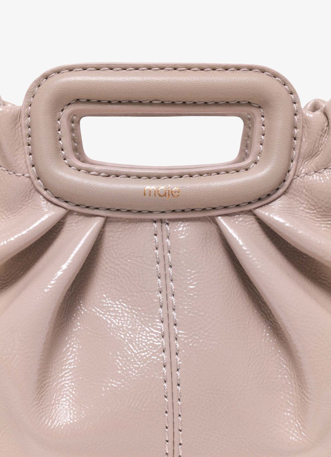 Maje Clutch van lakleer - achterkant beige