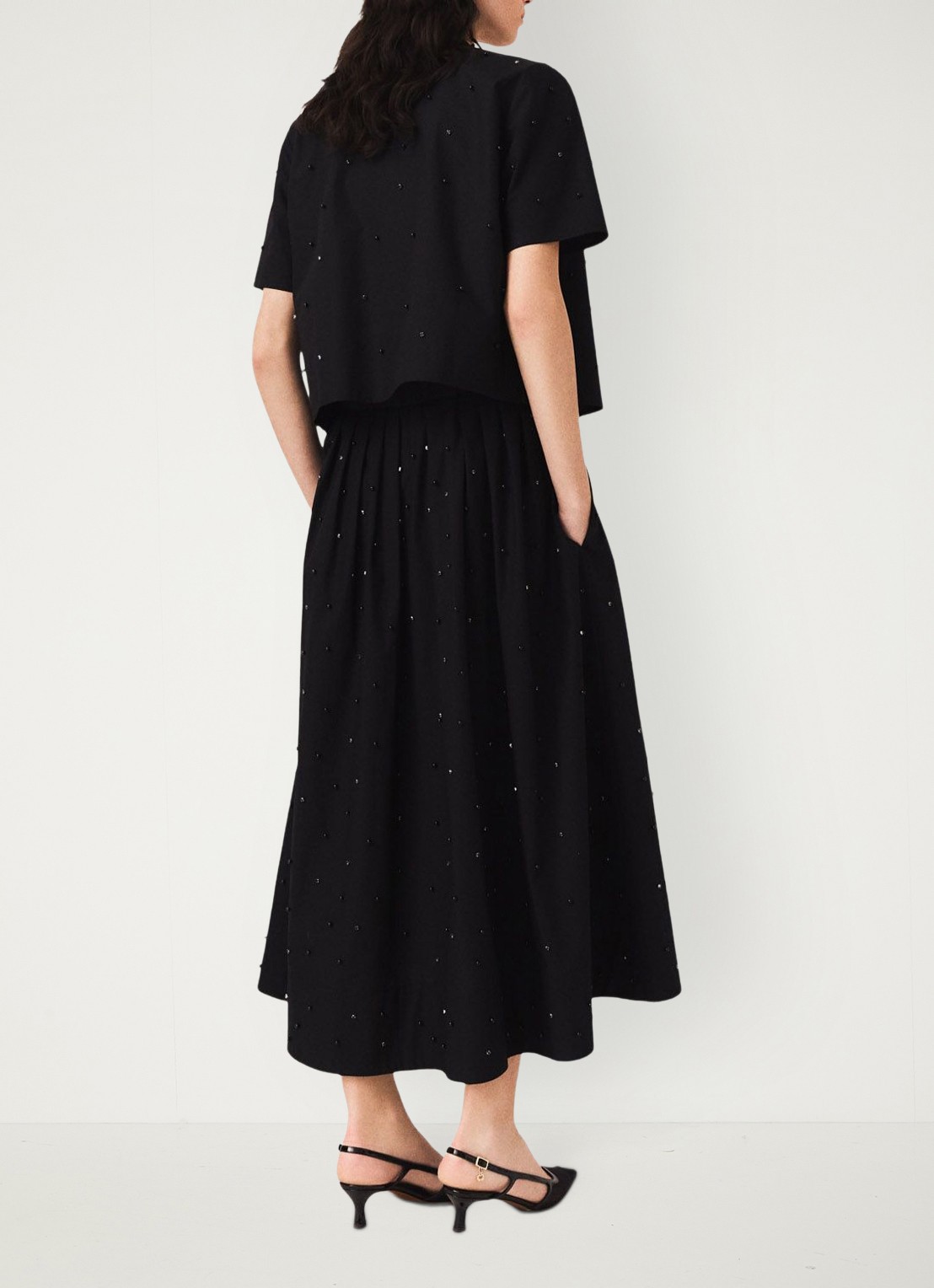 Maje Midi rok met strass en steekzakken - achterkant zwart