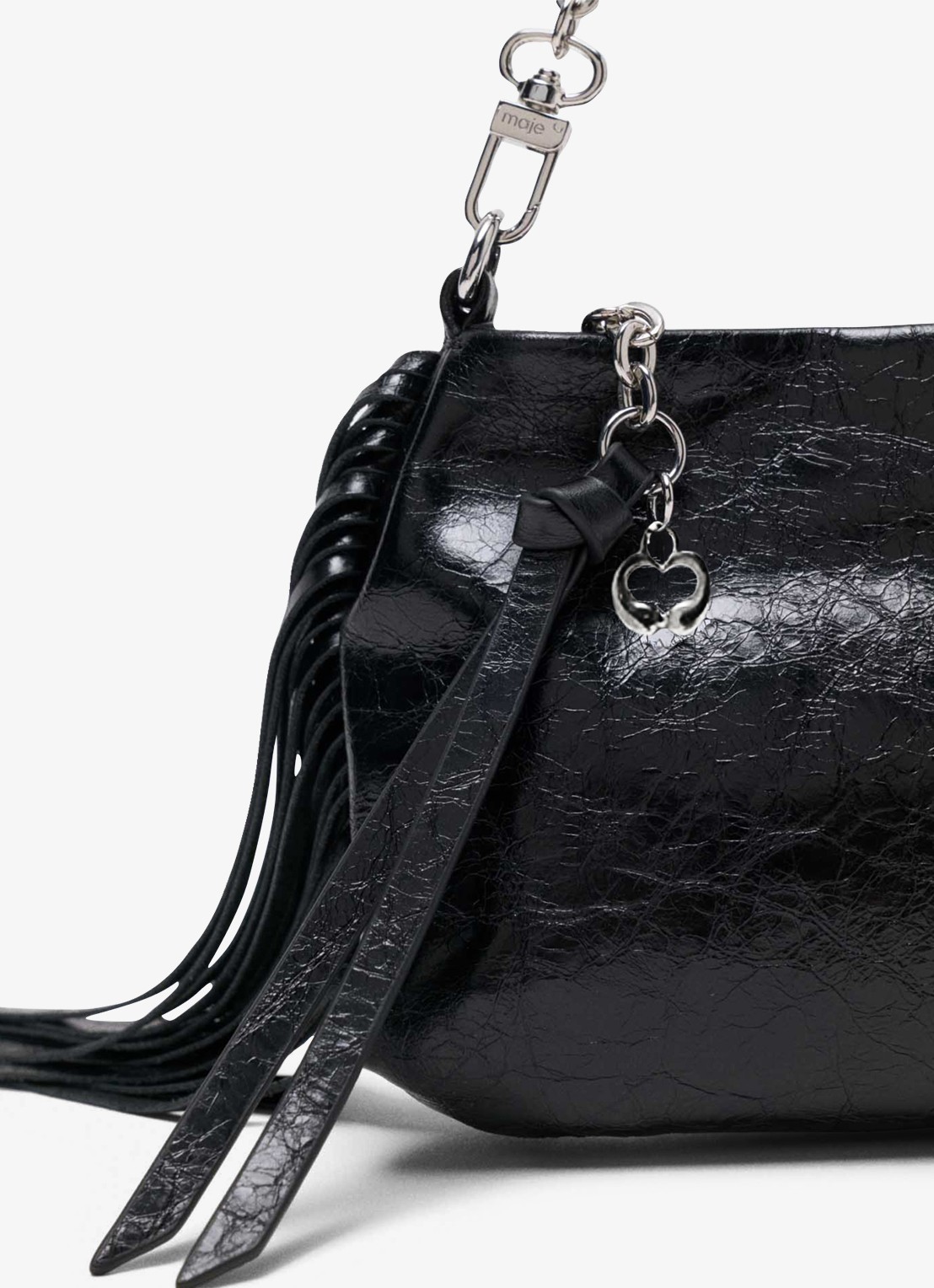 Maje Miss M schoudertas van leer met franjes - detail jeans