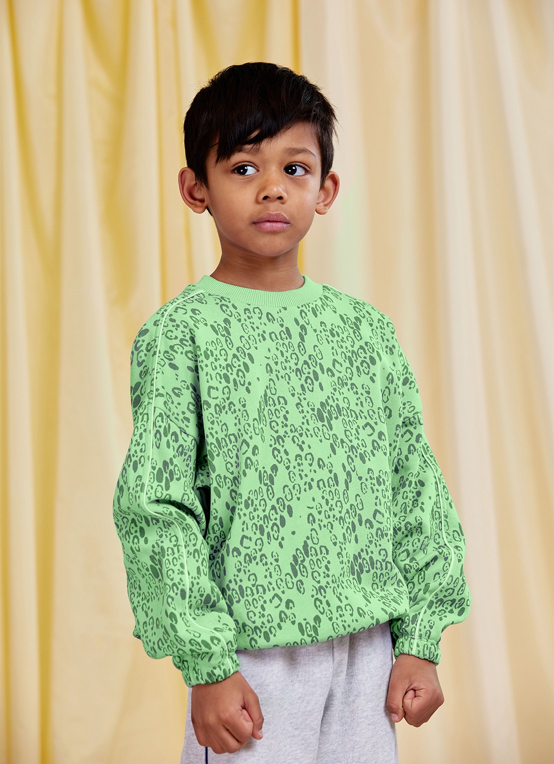 Mini Rodini Sweater met panterprint - voorkant 2 groen