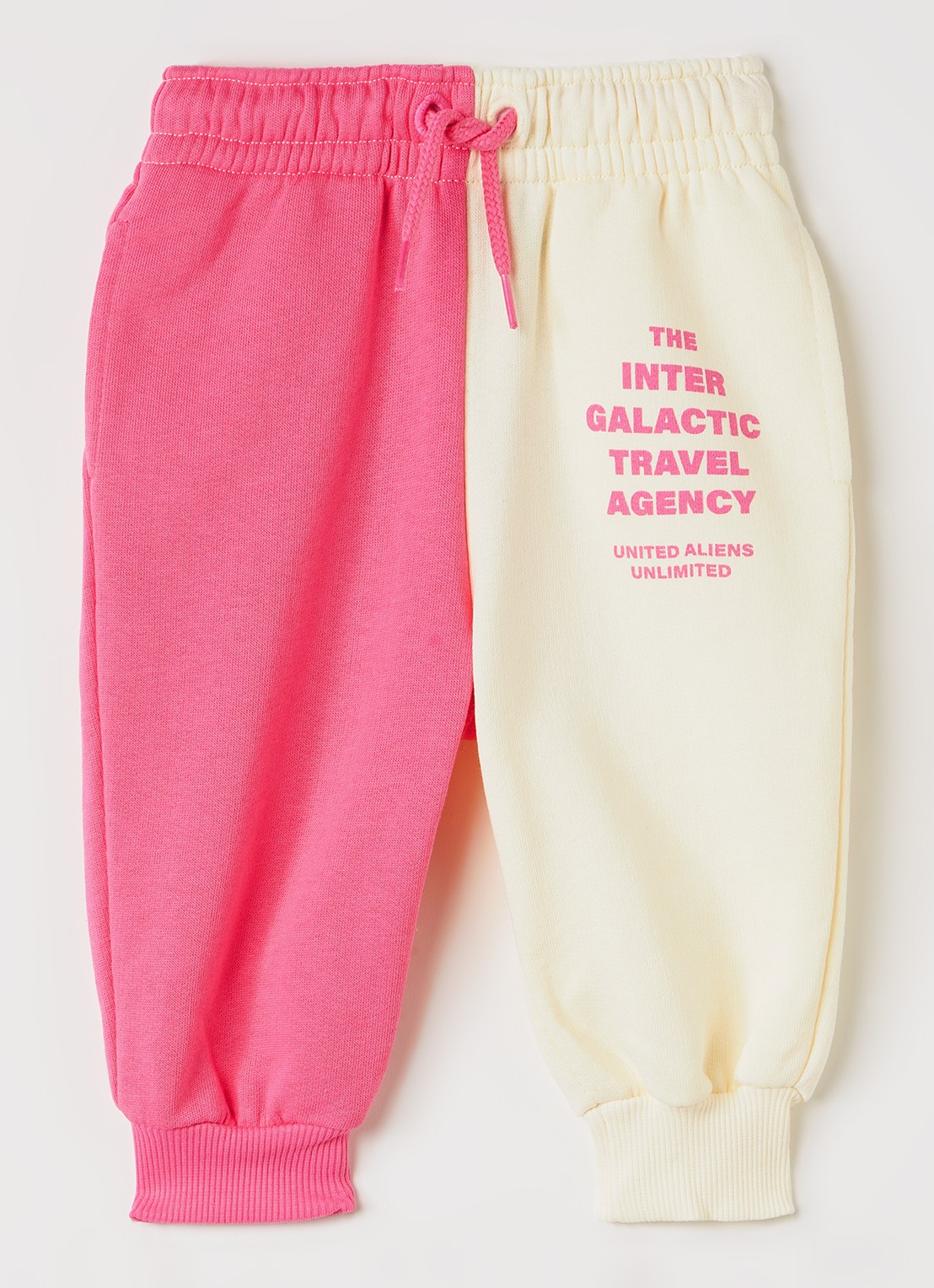 Mini Rodini Travel Agency tapered fit joggingbroek met print - voorkant roze