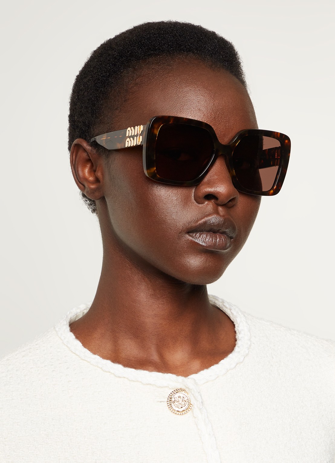Miu Miu Butterfly zonnebril MU10YS - voorkant 2 donkerbruin