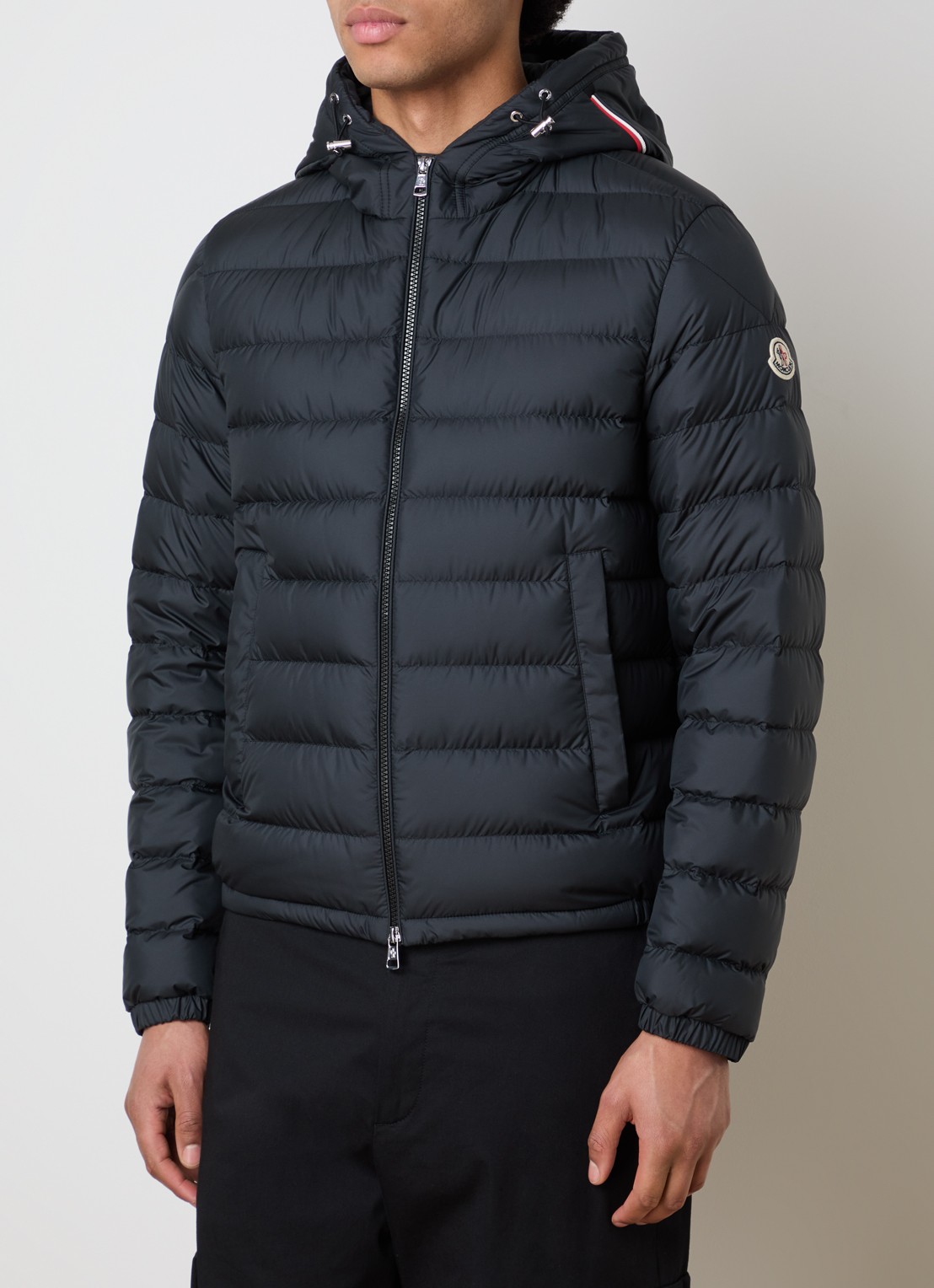 Moncler Gewatteerde jas met donsvulling en capuchon - detail zwart