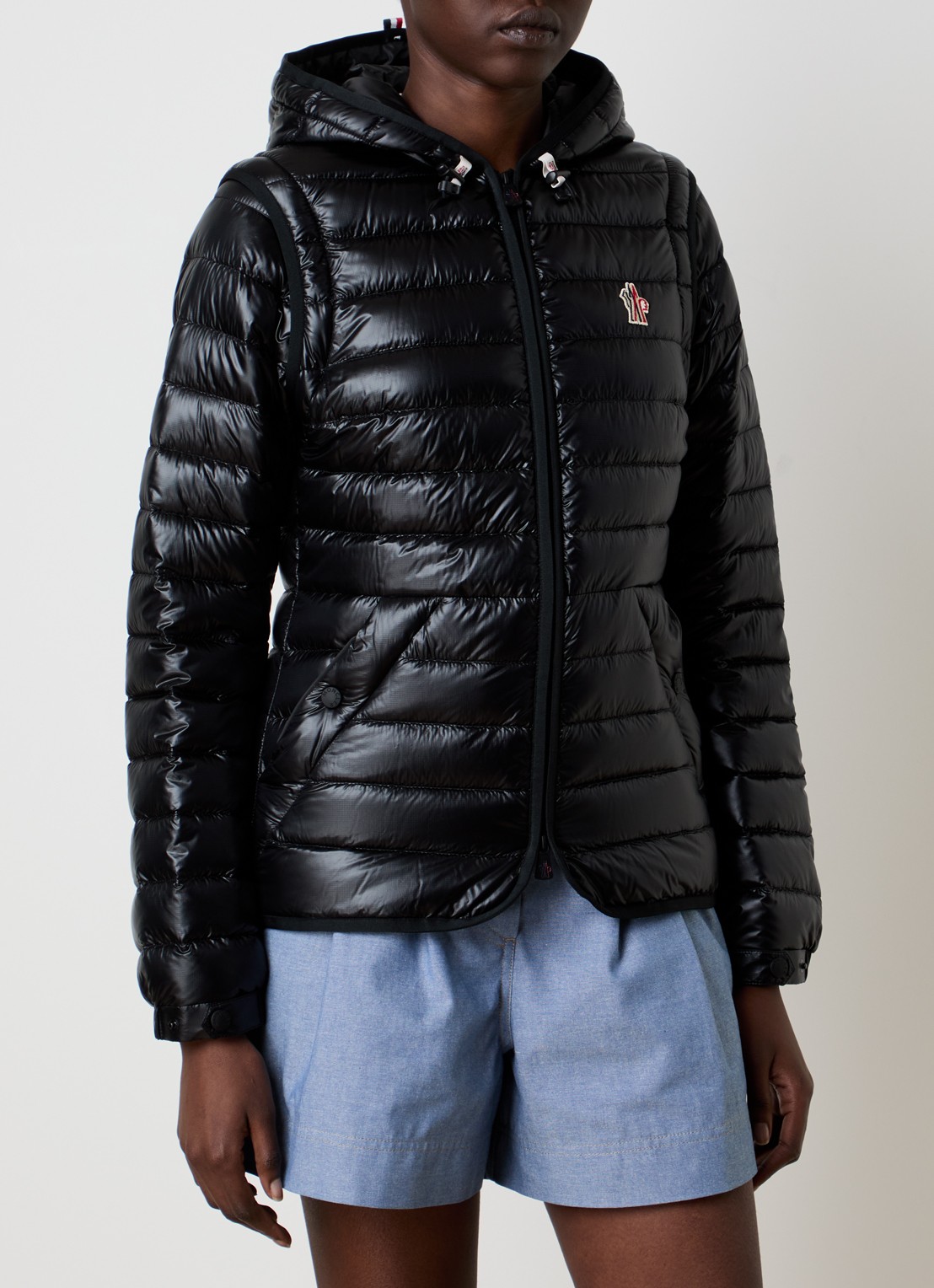 Moncler Karuras puffer jack met donsvulling en capuchon - detail 5 zwart