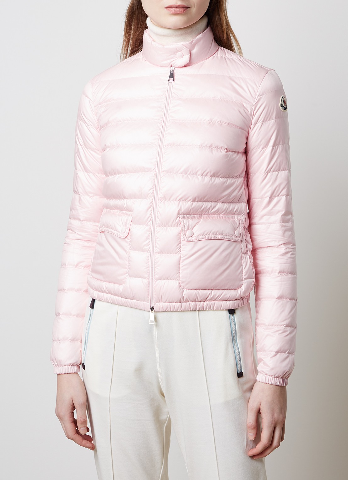 Moncler Puffer jack met donsvulling en klepzakken - detail roze