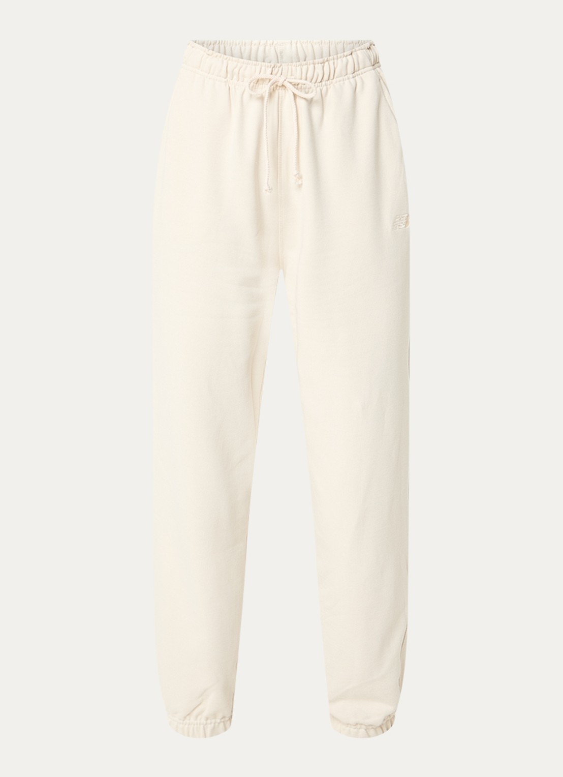 New Balance High waist tapered fit joggingbroek met steekzakken - voorkant 2 gebroken wit