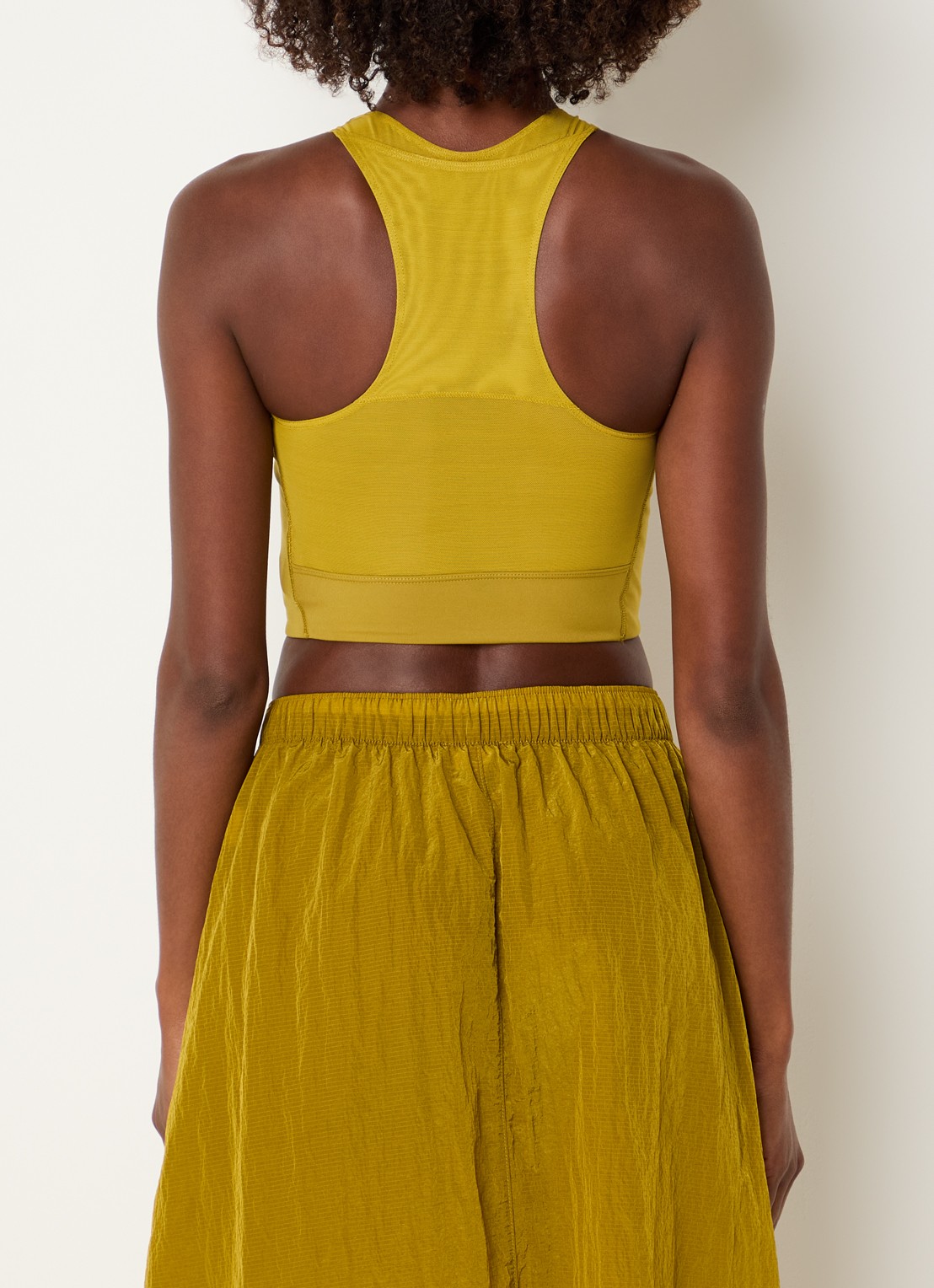 New Balance Tanktop met logo - achterkant okergeel