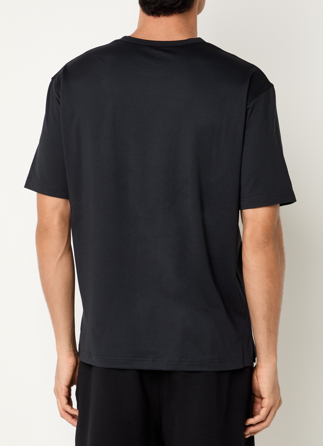 New Balance Trainings T-shirt met logo - achterkant zwart