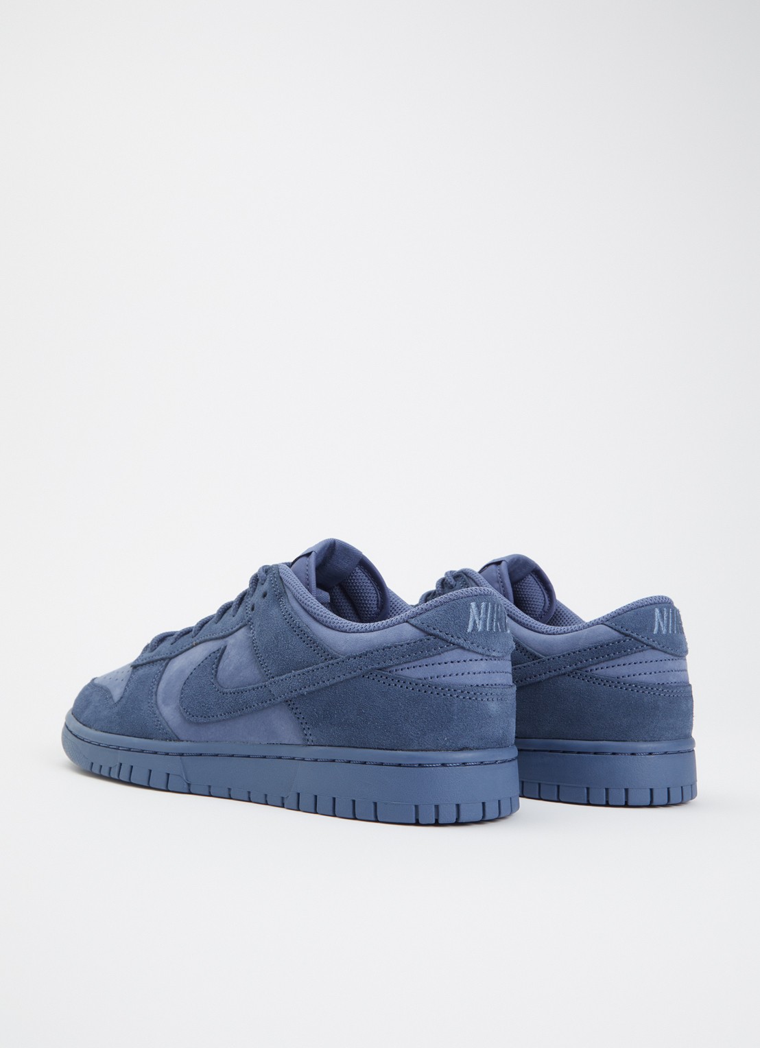 Nike Dunk Low sneaker met suède details - achterkant staalblauw