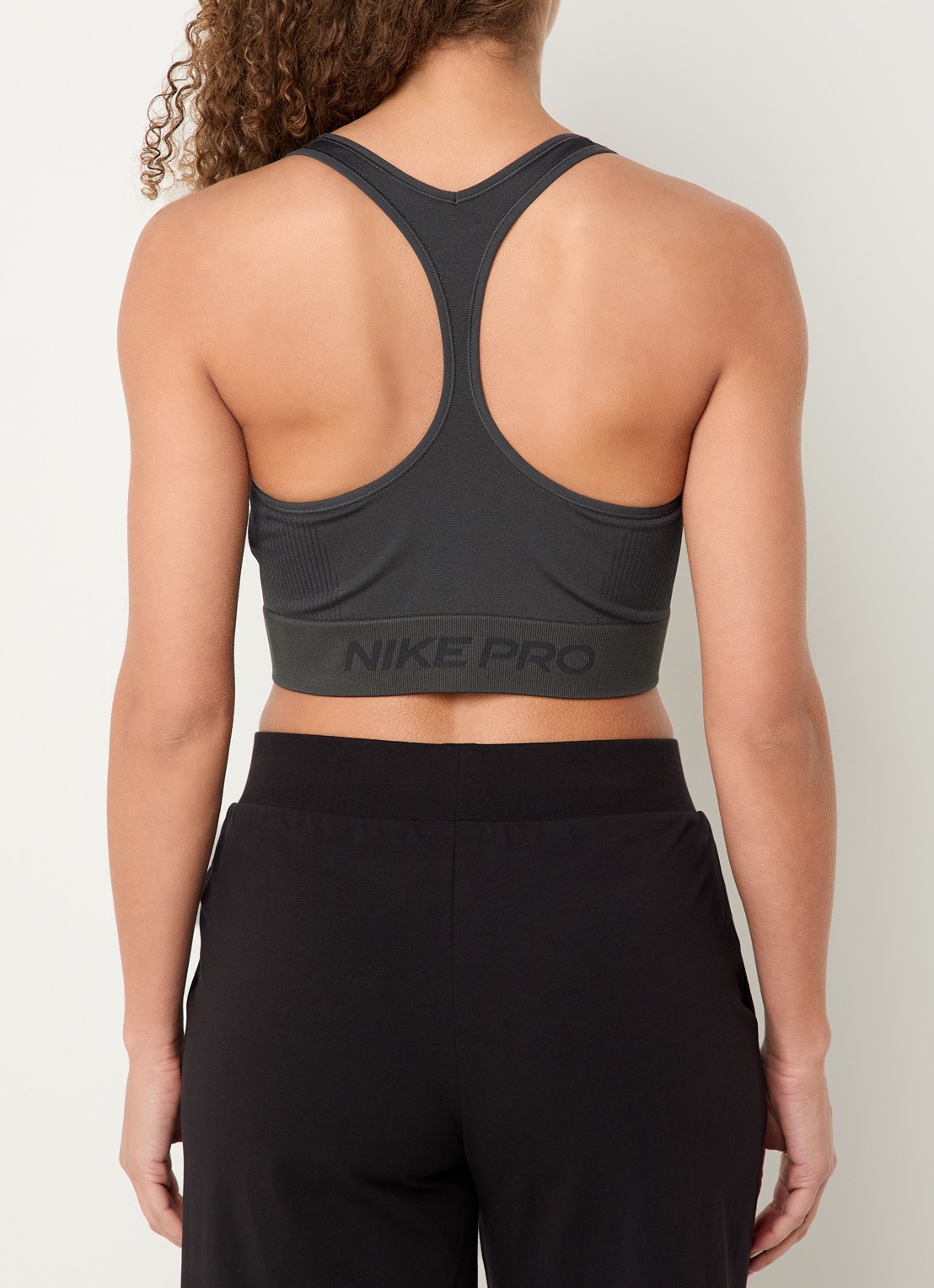 Nike Sport bh met light support en logo - achterkant antraciet